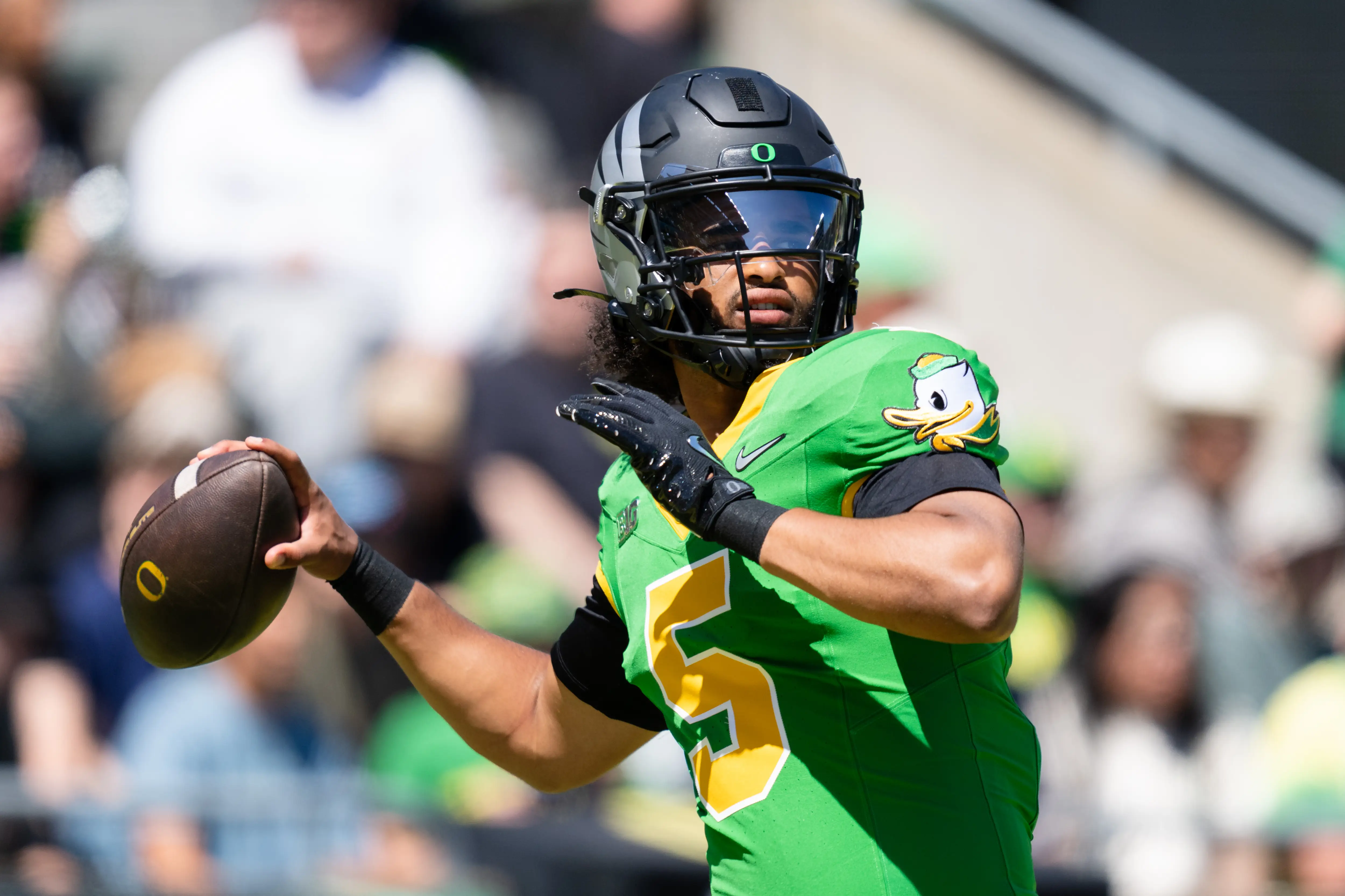 Quarterback Dante Moore #5 of the Oregon Ducks warms up before the spring football game at Autzen Stadium.