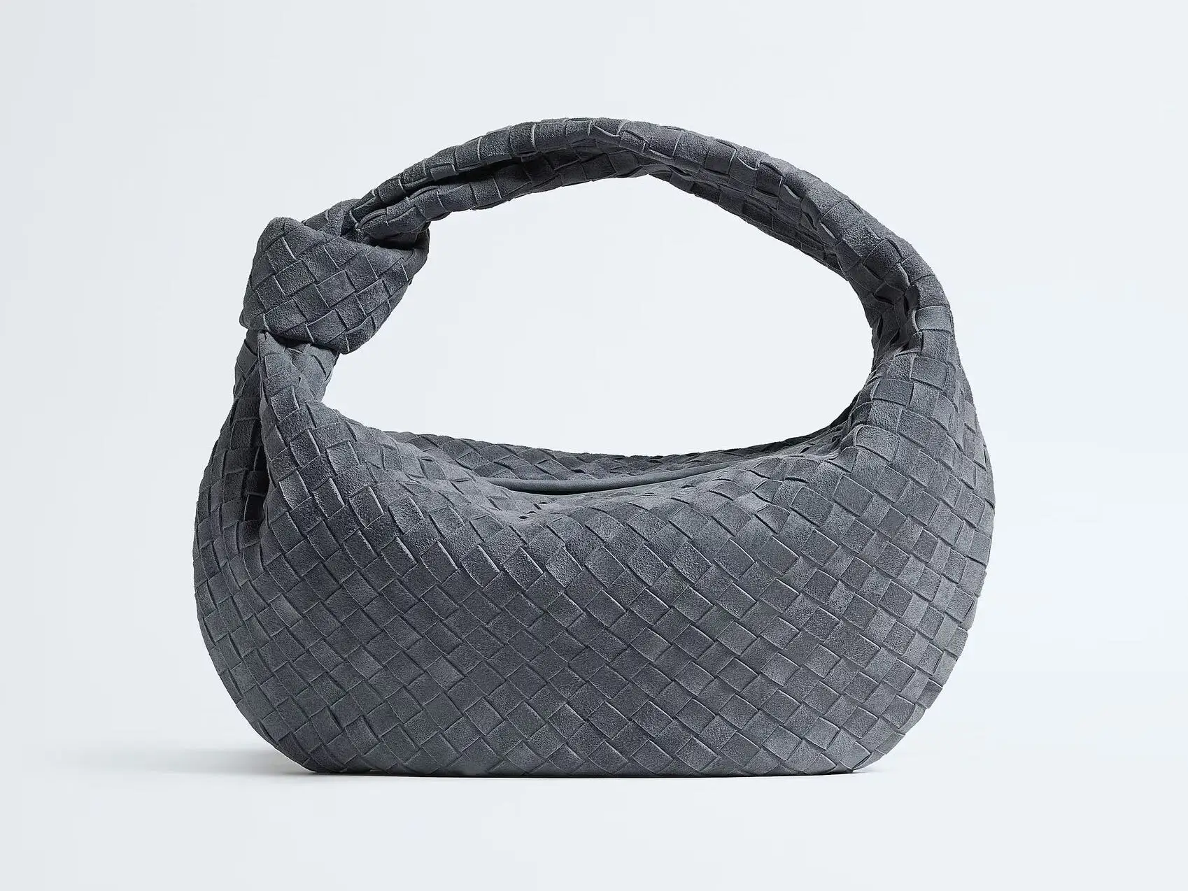 The Jodie bag from Bottega Veneta in the color cloudy indigo.