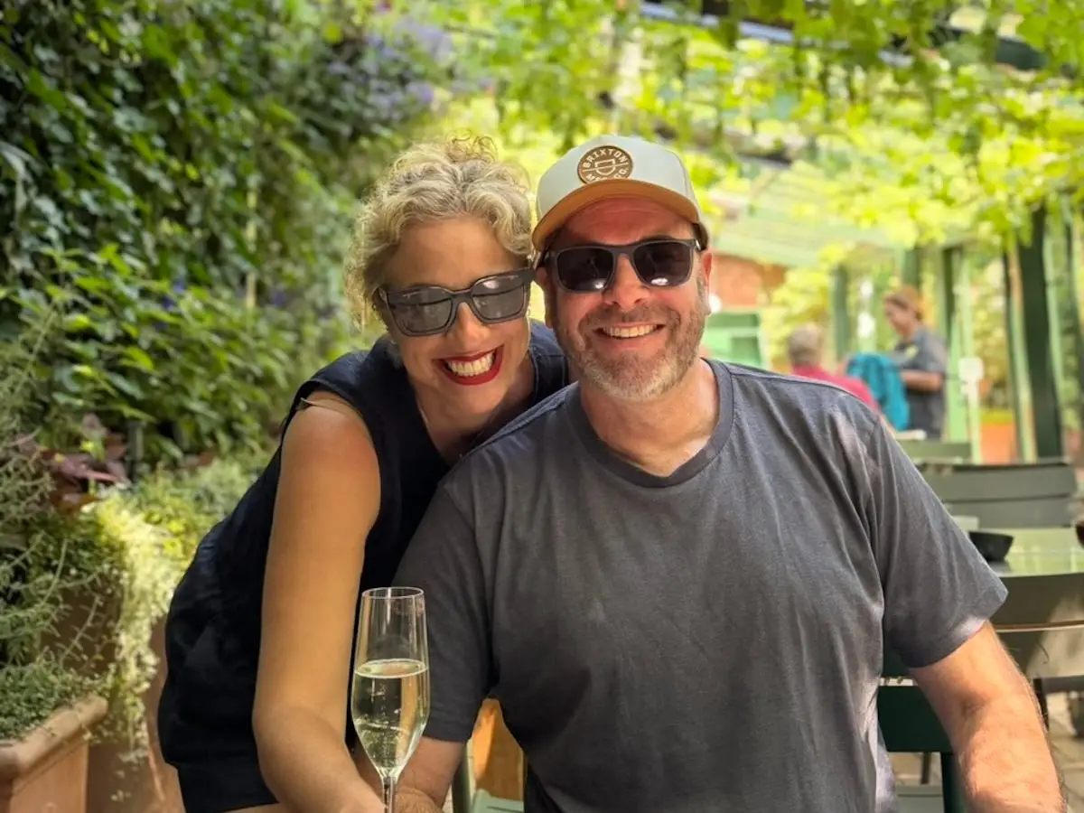 The author and her husband in an outdoor patio