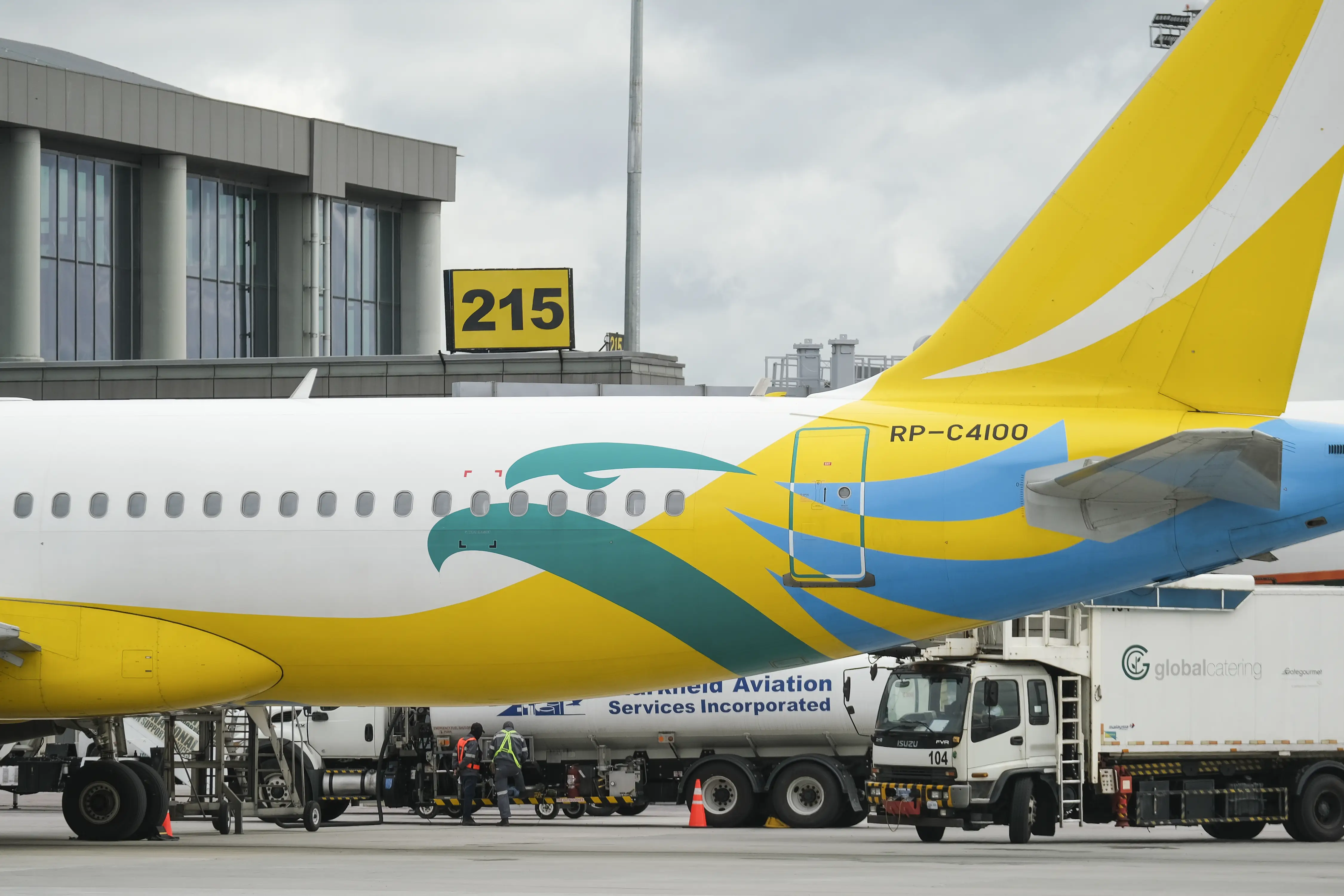 Cebu pacific plane at the gate.