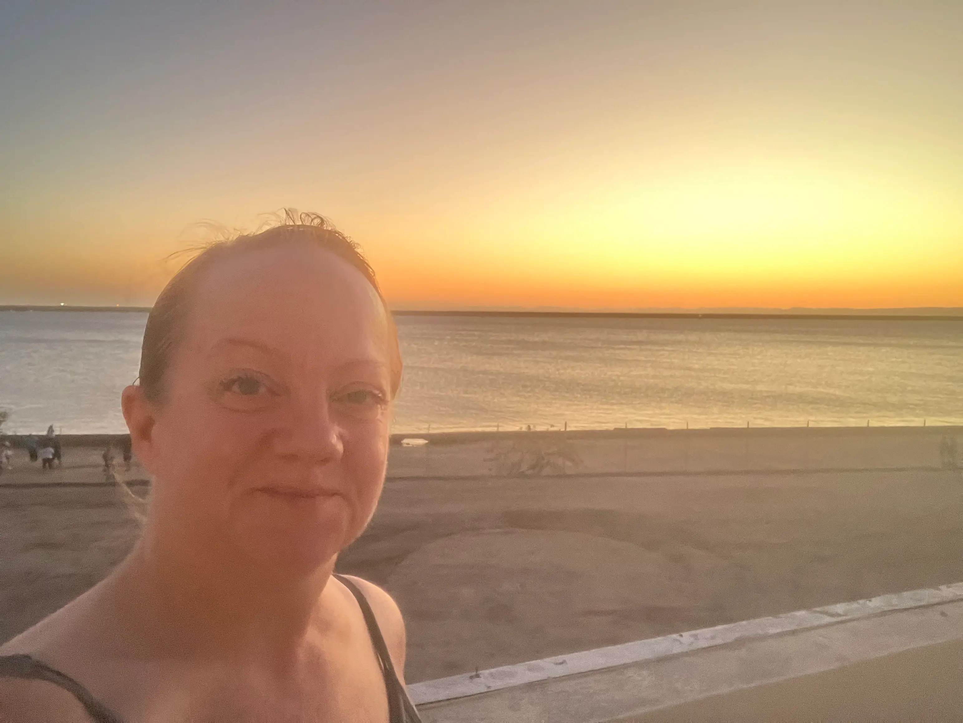 Woman smiling at beach
