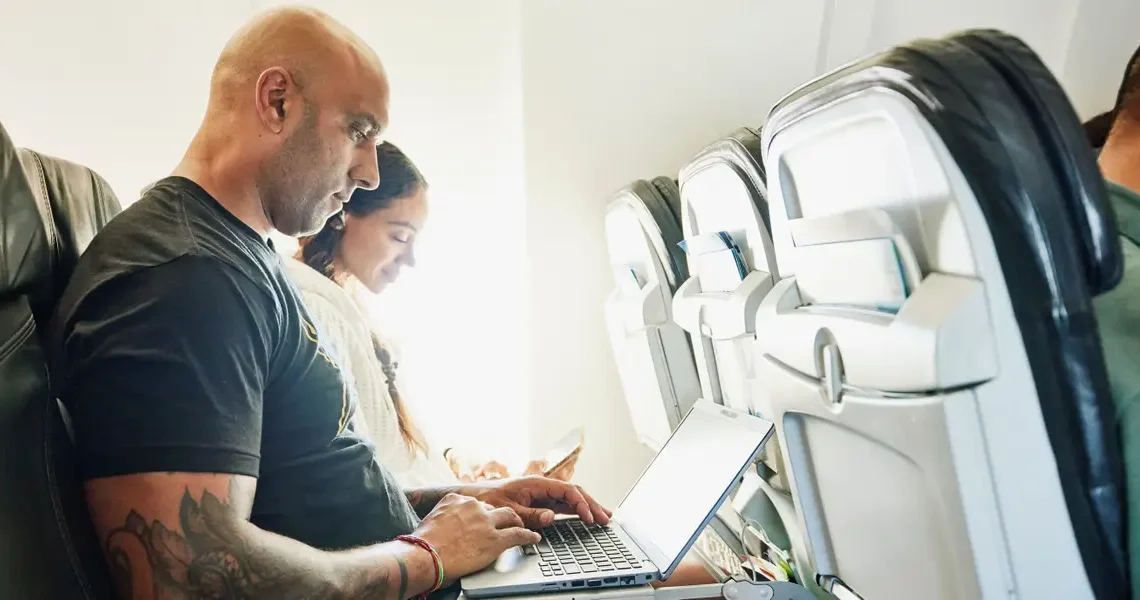 Elon Musk’s Starlink is dominating in-flight WiFi. Here’s which airlines have it — and how to check if your plane does.