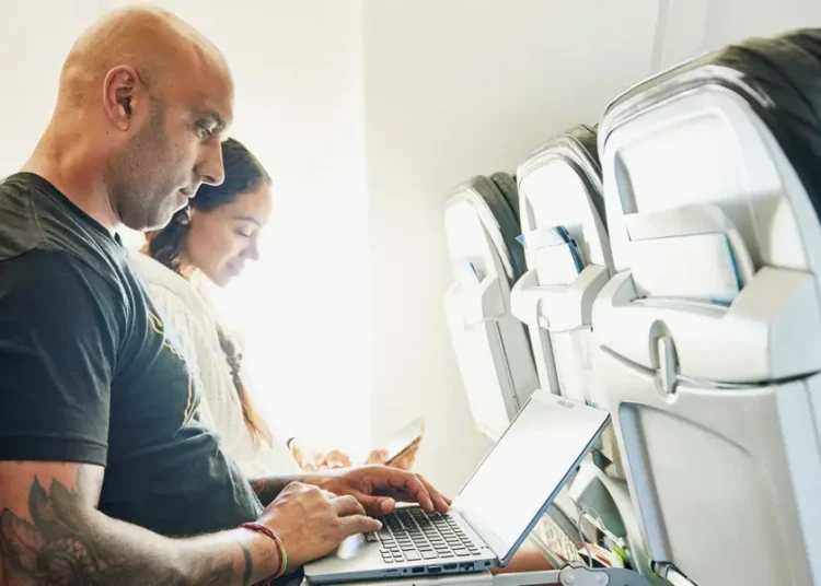 Elon Musk’s Starlink is dominating in-flight WiFi. Here’s which airlines have it — and how to check if your plane does.