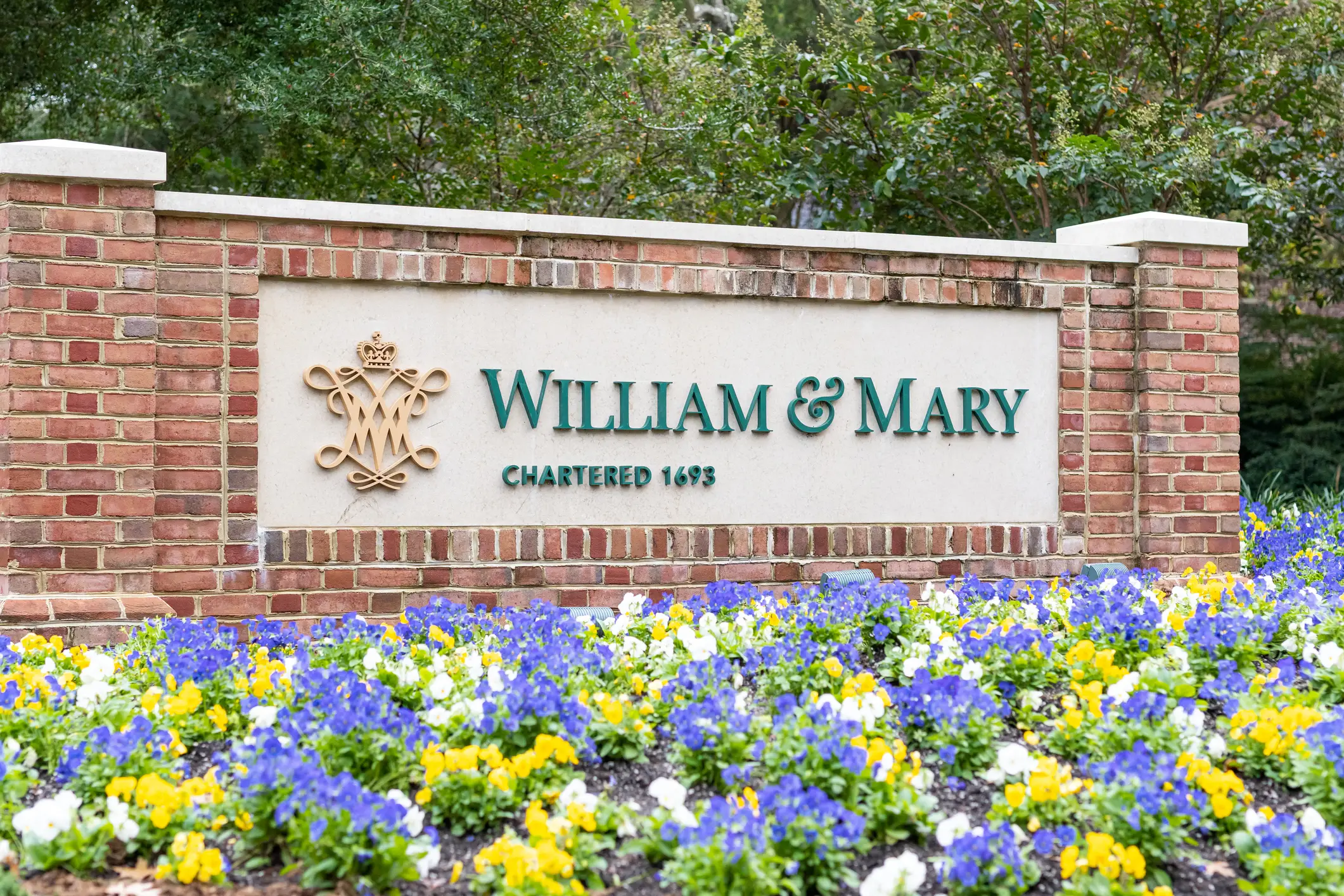 The sign for William and Mary college outside the campus in downtown Williamsburg.