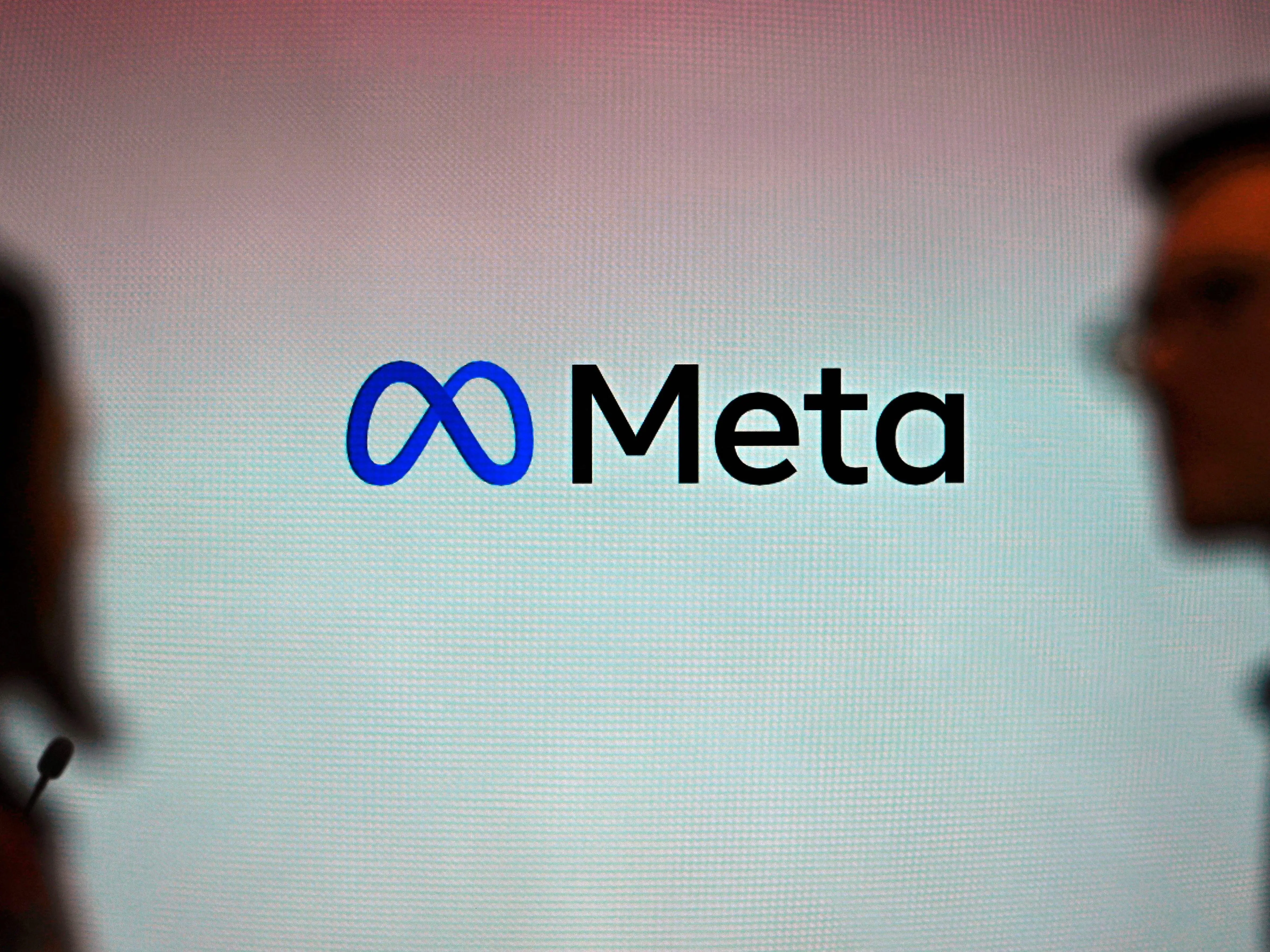 A Meta sign is pictured.