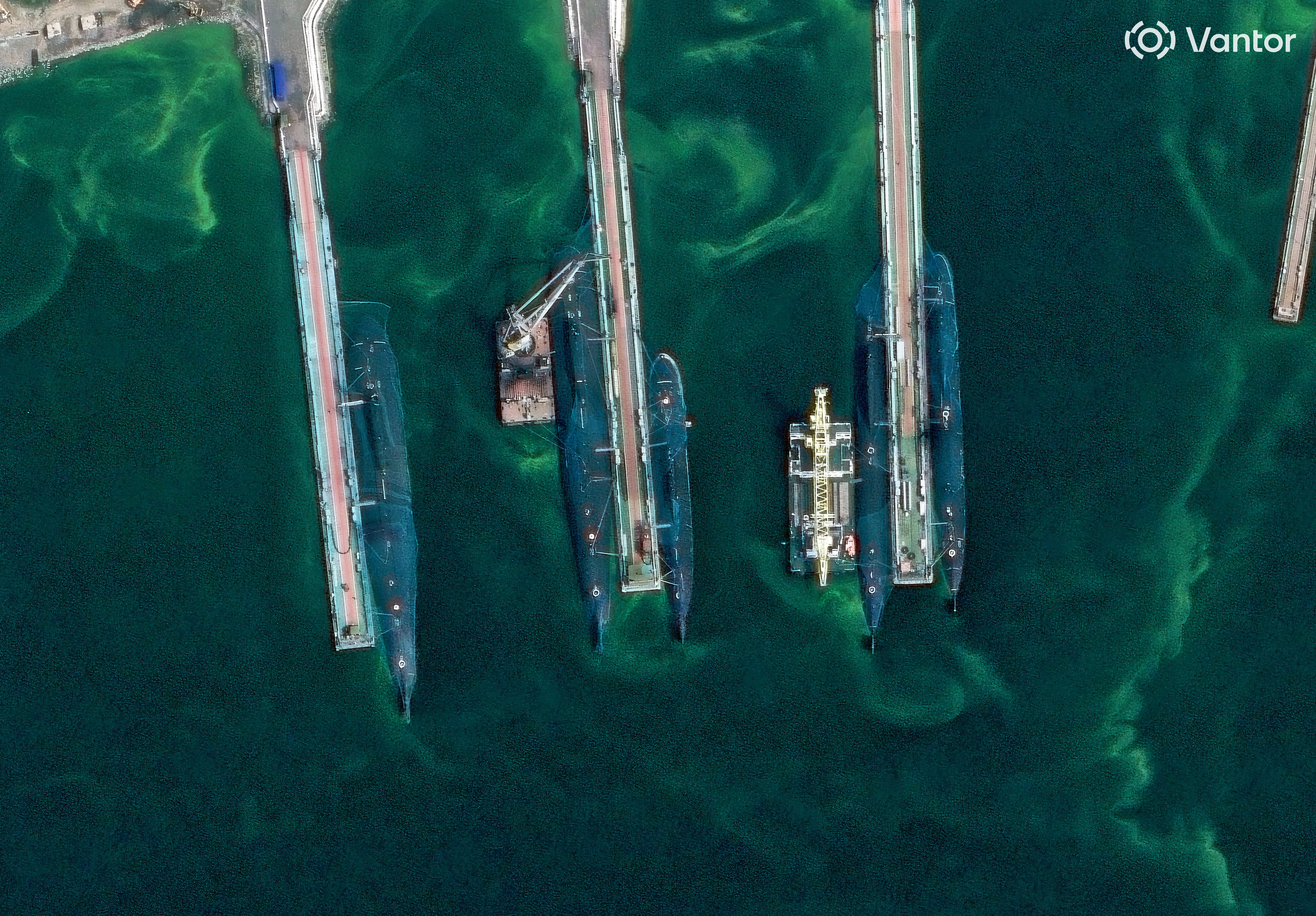 Anti-drone netting over submarines at Rybachiy in August.