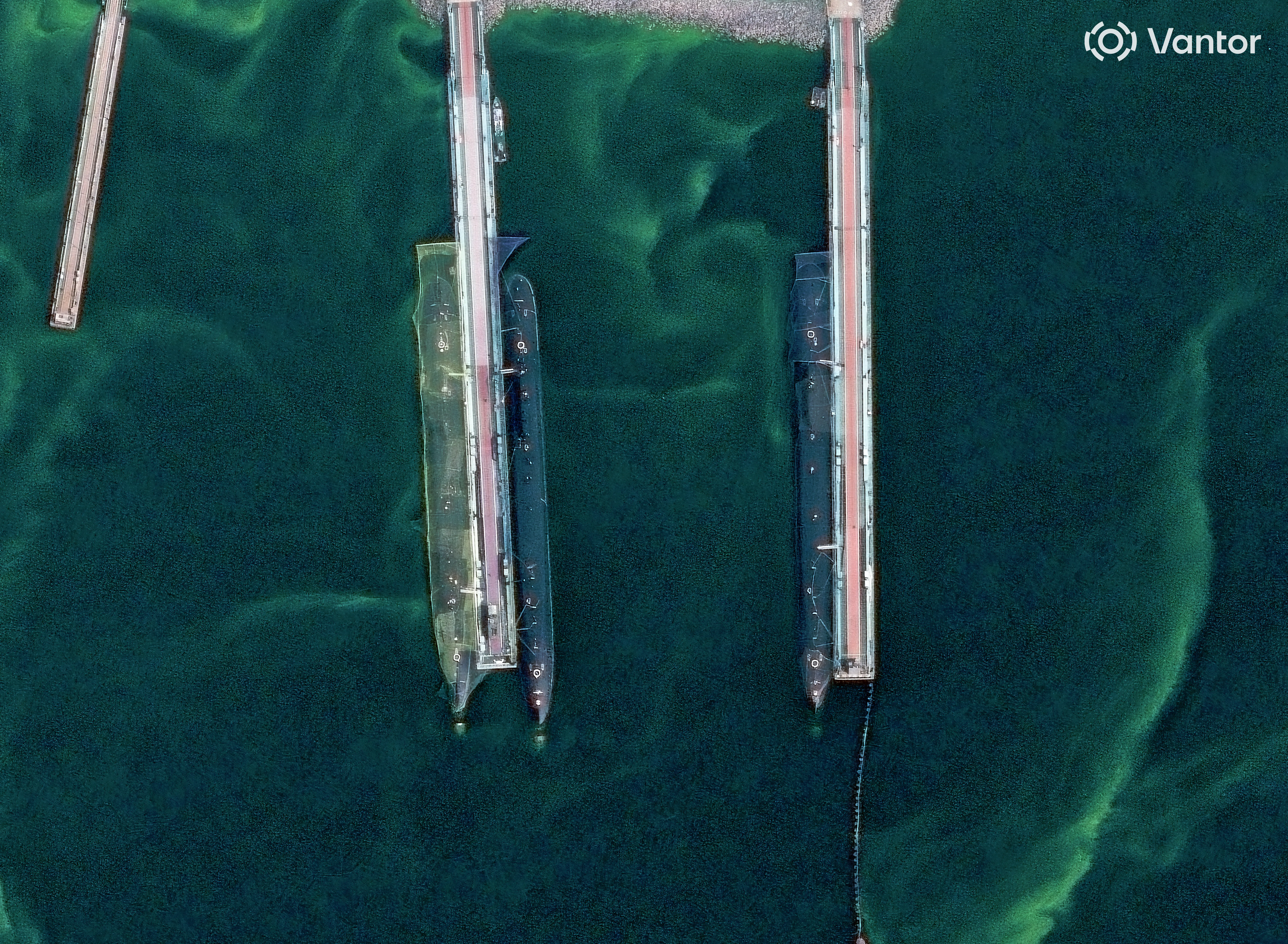 Anti-drone netting over submarines at Rybachiy in August.