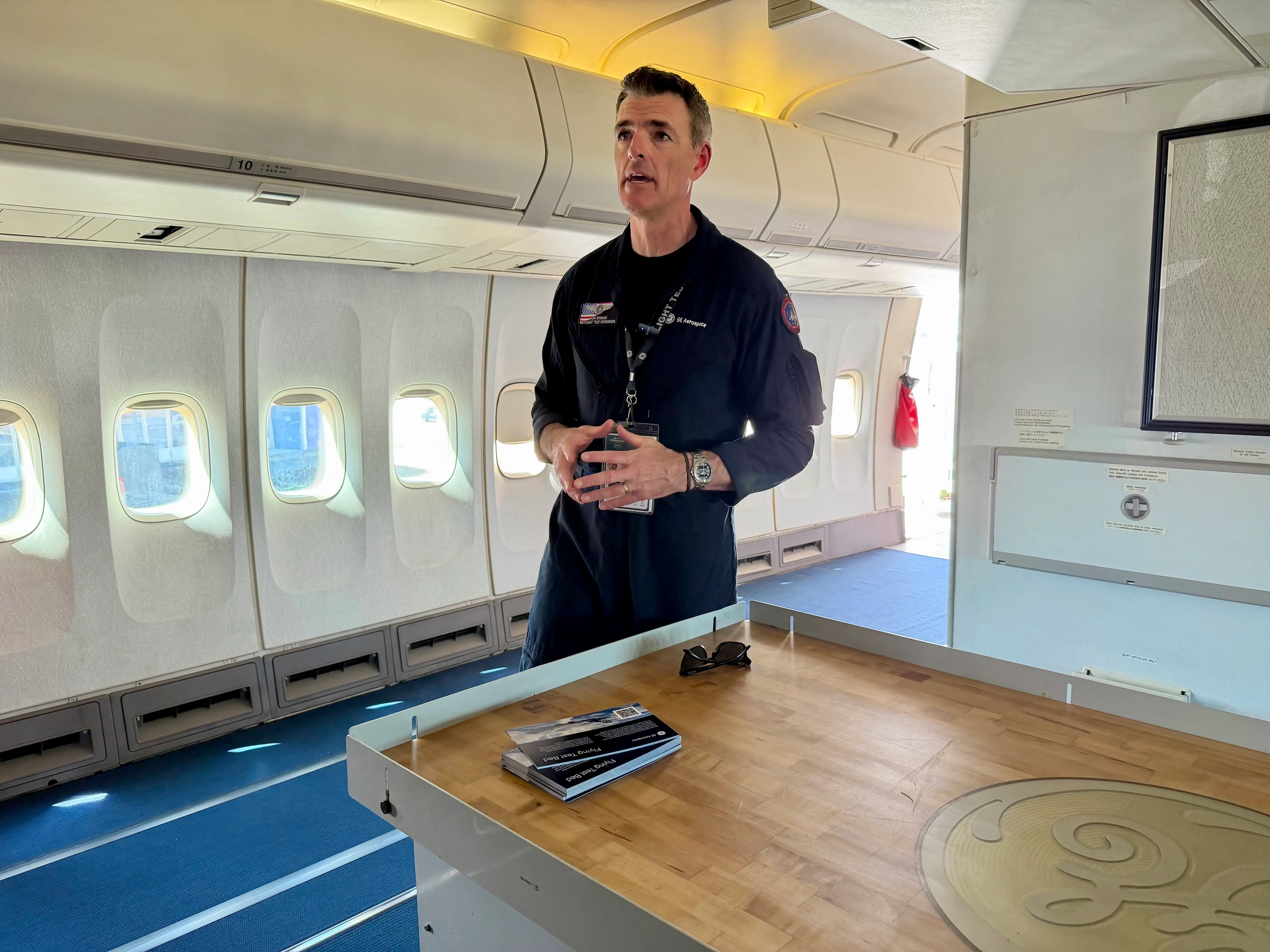 The chief test pilot speaking to the media.