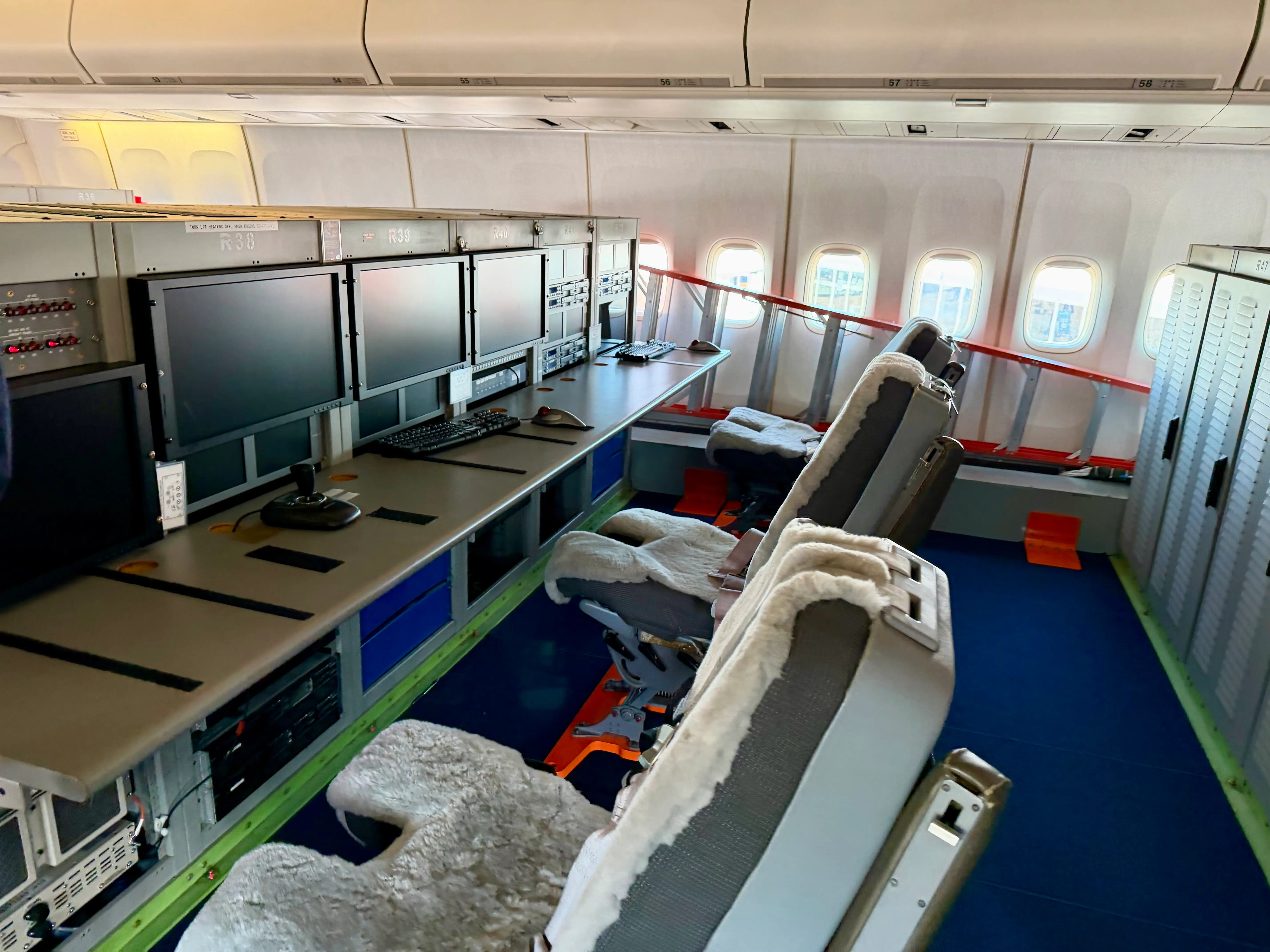 The test engineer workstations with computer screens.