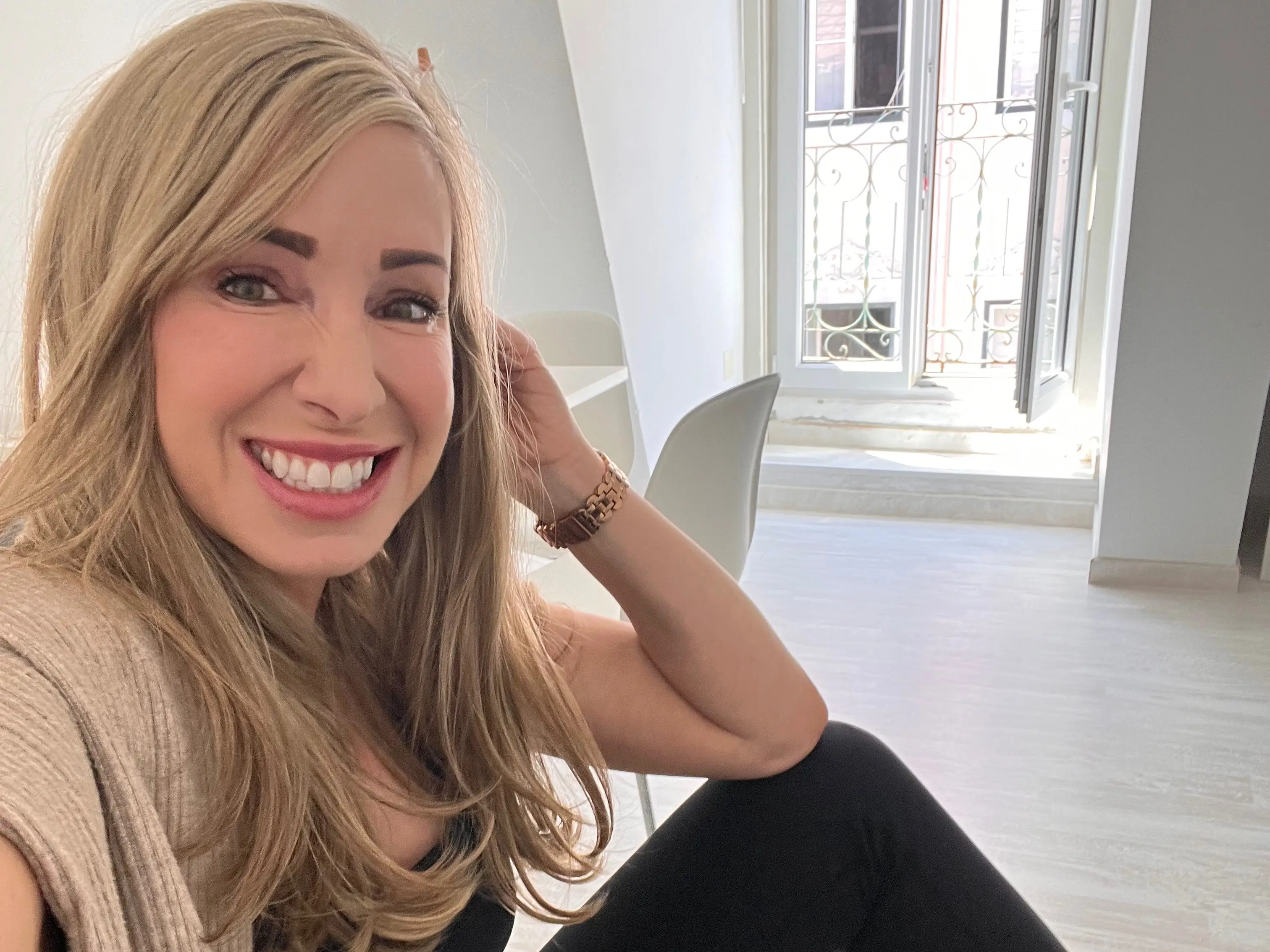 Woman smiling in apartment