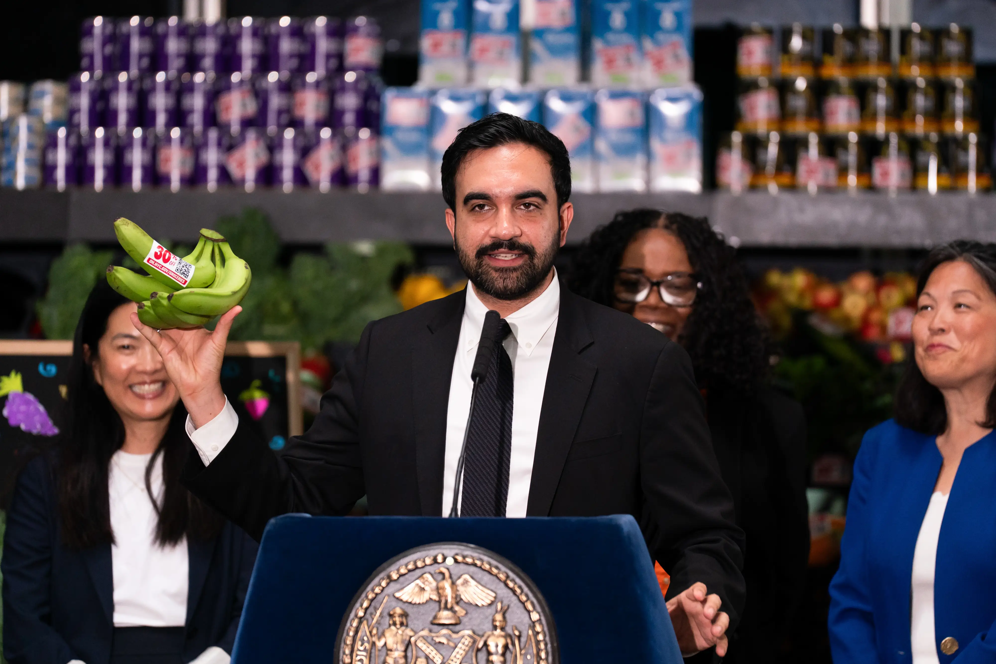 zohran mamdani at a grocery press event