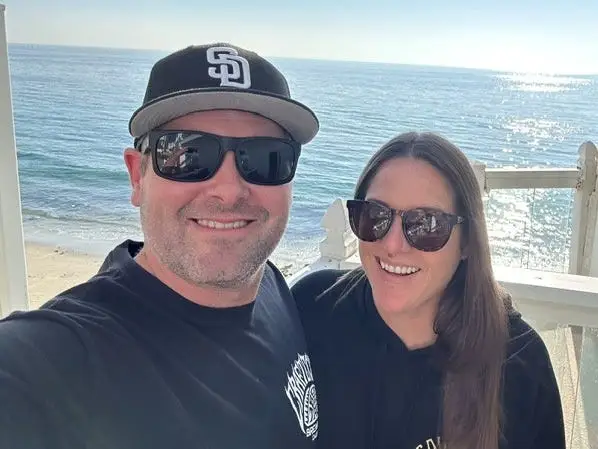 Justin Berk and his wife on vacation shortly after the payout.