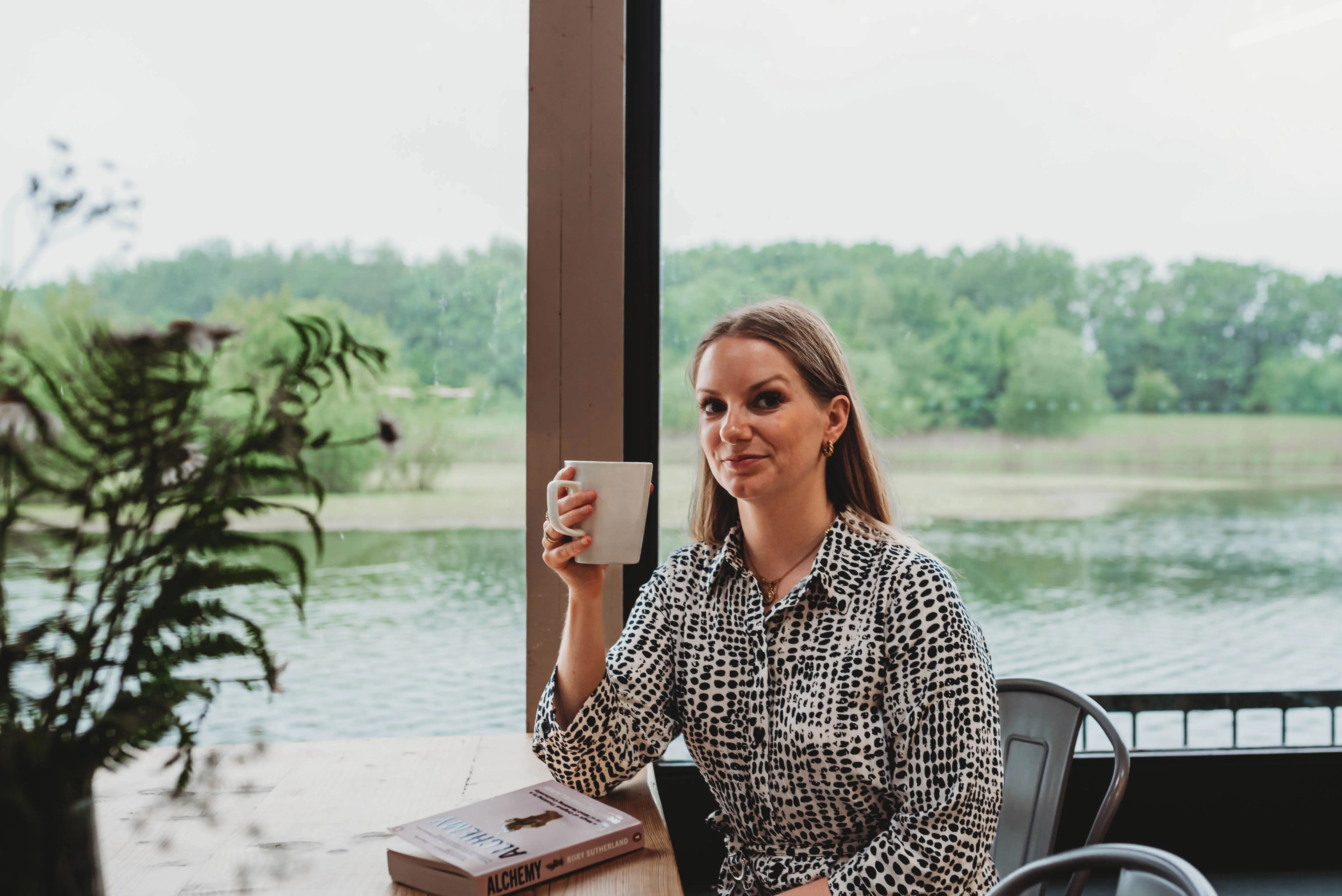 Woman holds mug