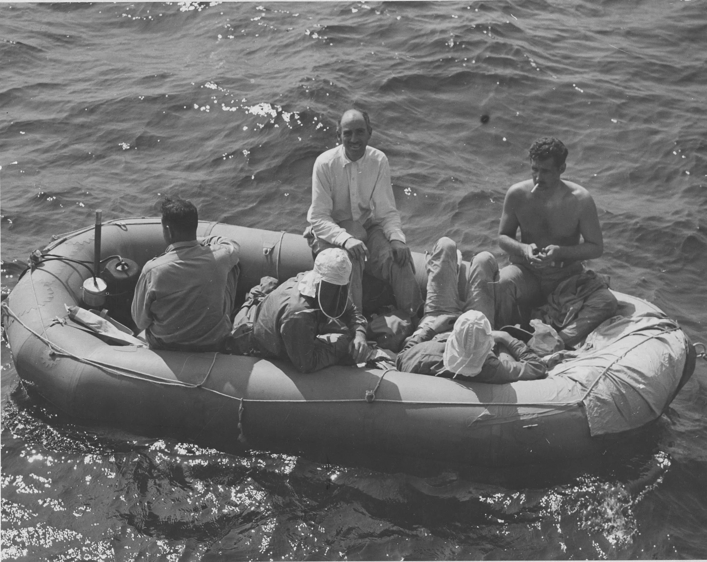 Six men testing a rubber life raft off Cape Fear, North Carolina.