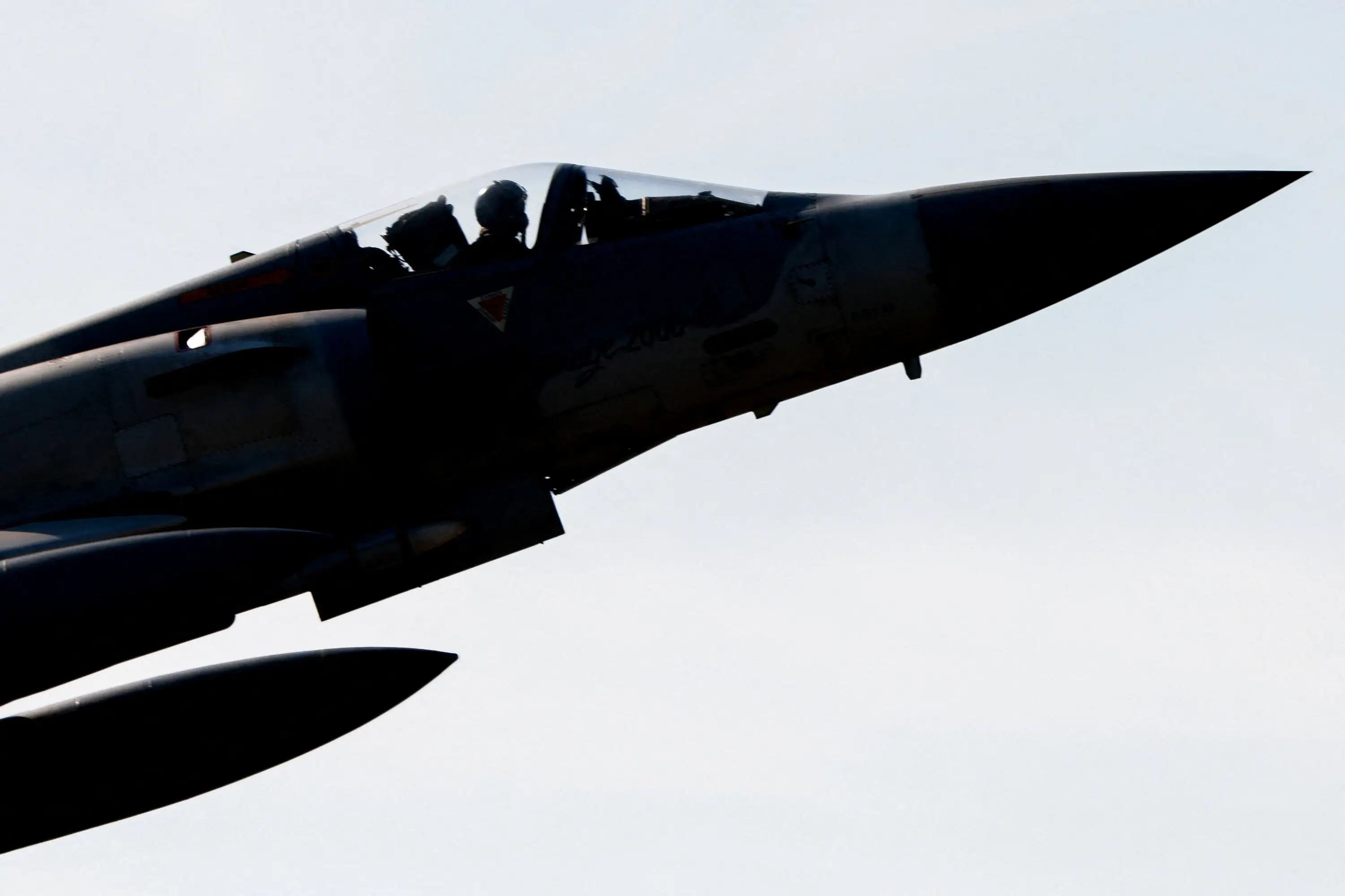 A single-seat Mirage 2000 fighter jet takes off.