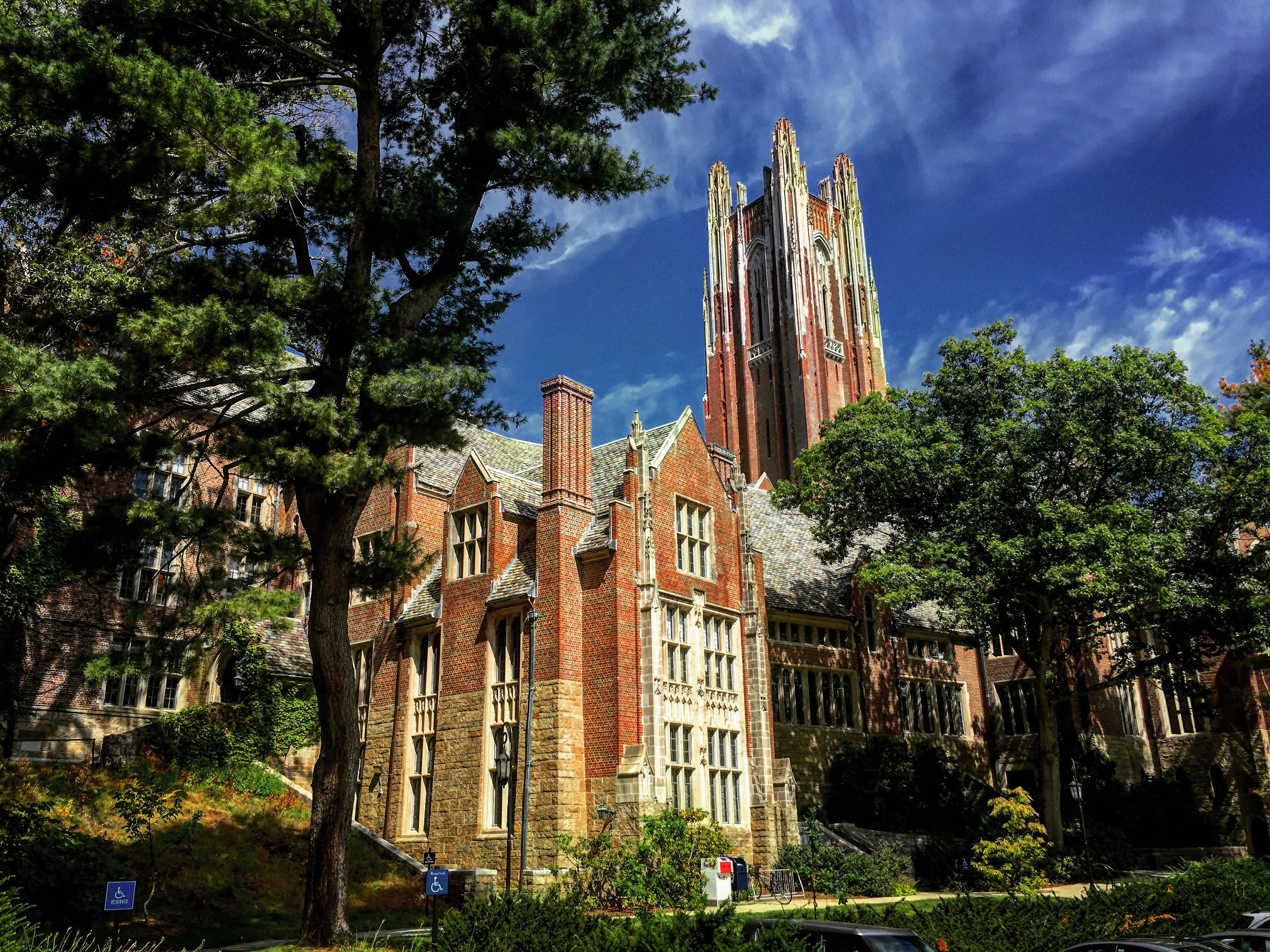 Bell Tower, Green Hall surrounded by trees at Wellesley College.