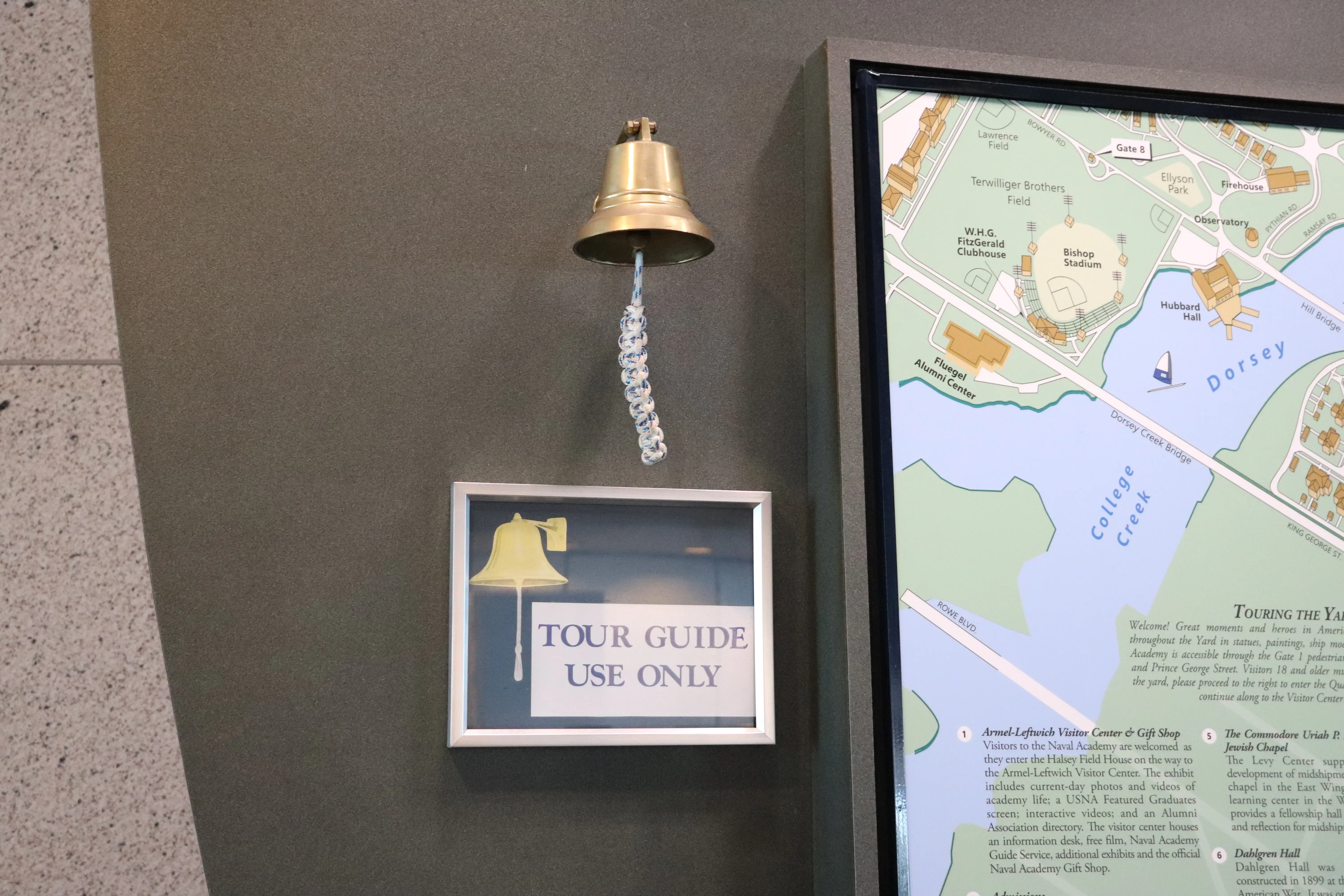 A bell used by tour guides at the US Naval Academy.