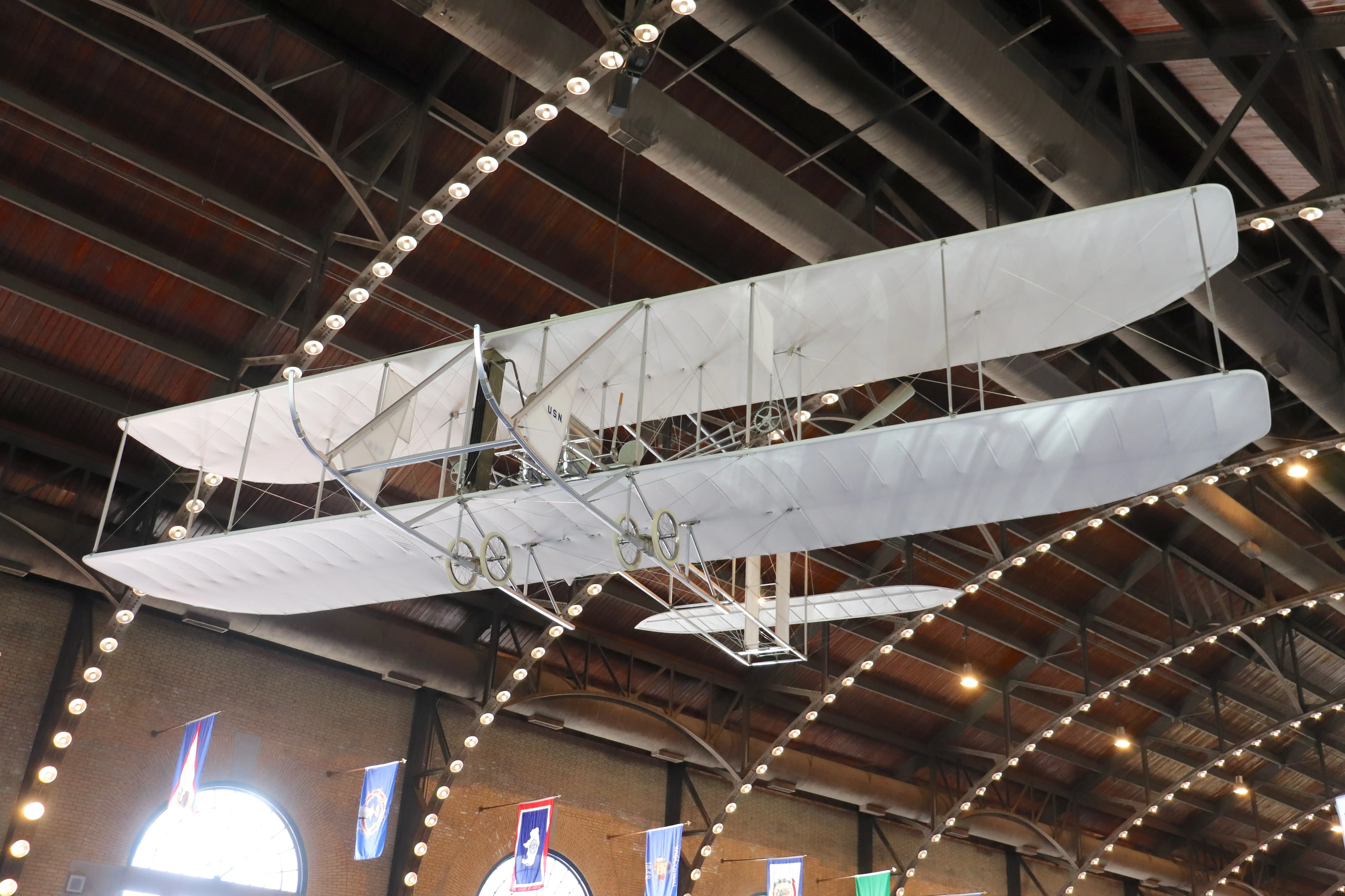 A model of a Wright Brothers plane inside Dahlgren Hall.