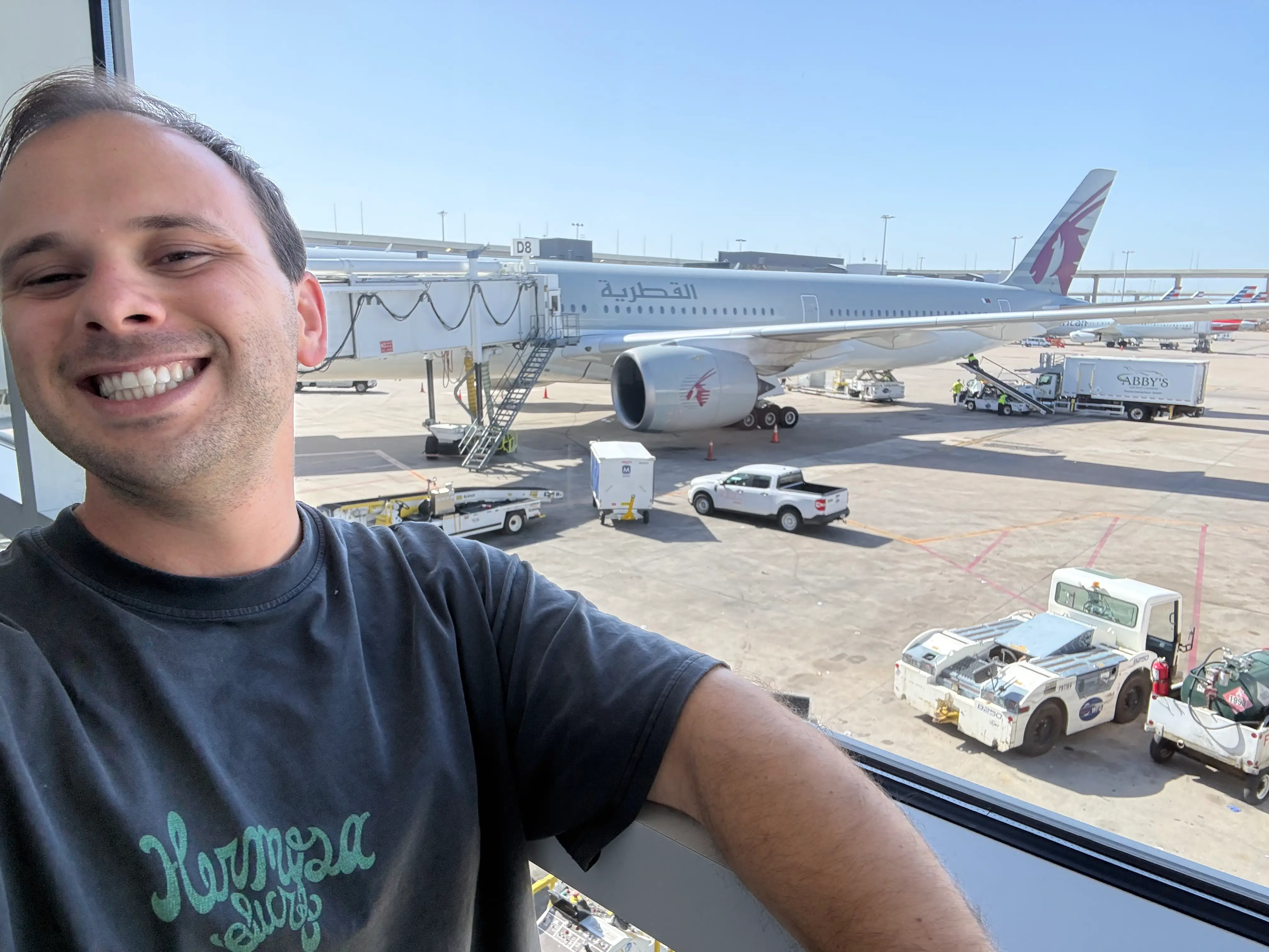 The author with the Qatar plane in the background.
