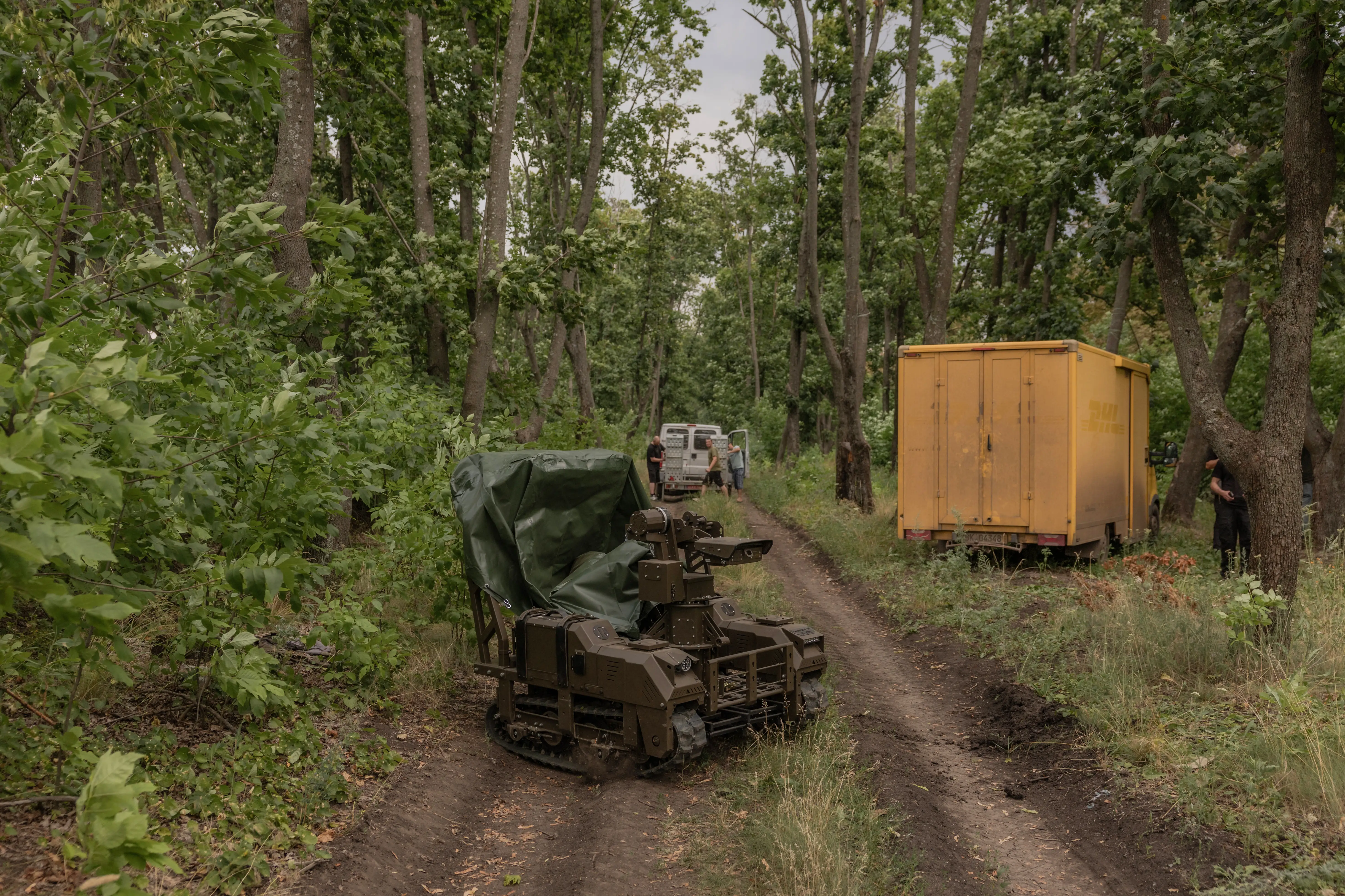 This photograph shows a Droid NW 40 unmanned ground combat vehicle as Ukrainian soldiers of the 33rd Separate Assault Regiment test it at an undisclosed location in the Kharkiv region on July 21, 2026.