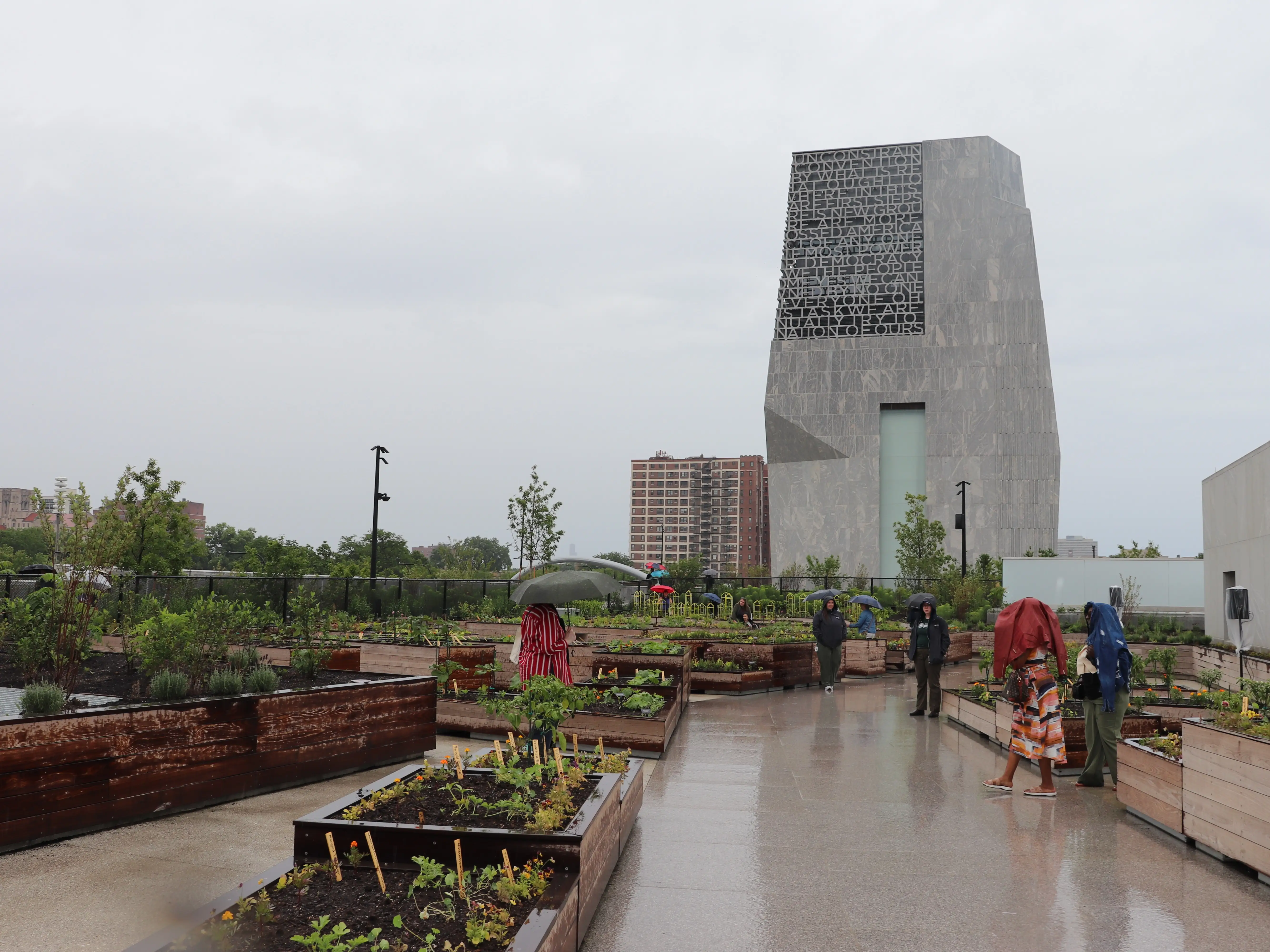 Visitors gather at the urban farm at the Obama Presidential Center in Chicago.