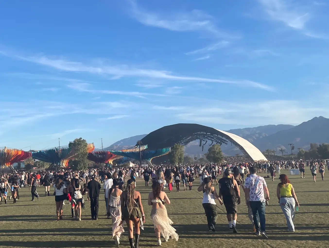 Crowds walking toward a stage at Coachella Music Festival in California.