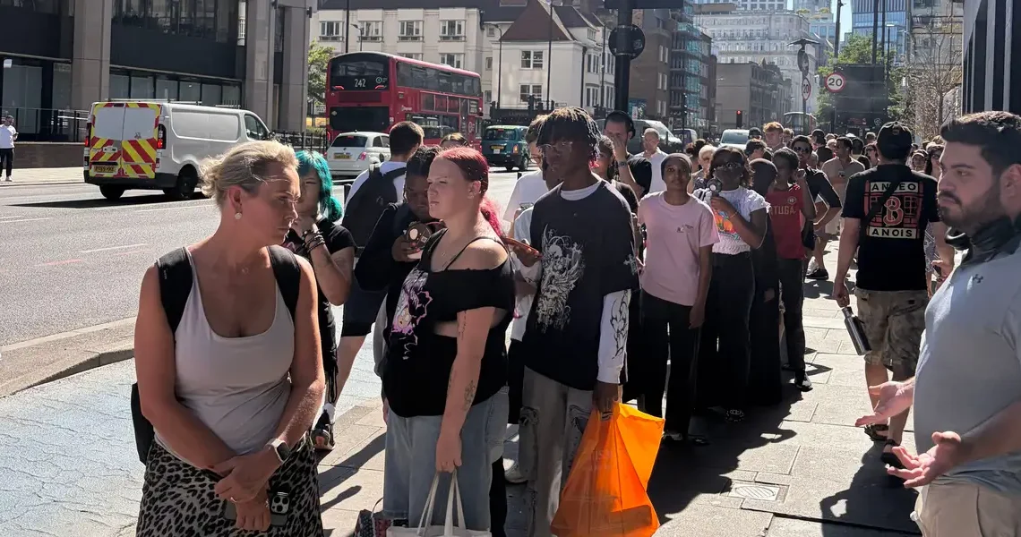 The hottest thing to do in London today is wait in line for solar eclipse glasses