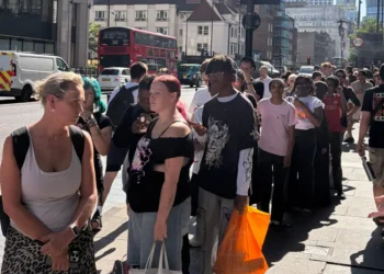 The hottest thing to do in London today is wait in line for solar eclipse glasses