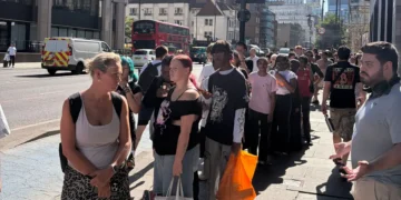 The hottest thing to do in London today is wait in line for solar eclipse glasses