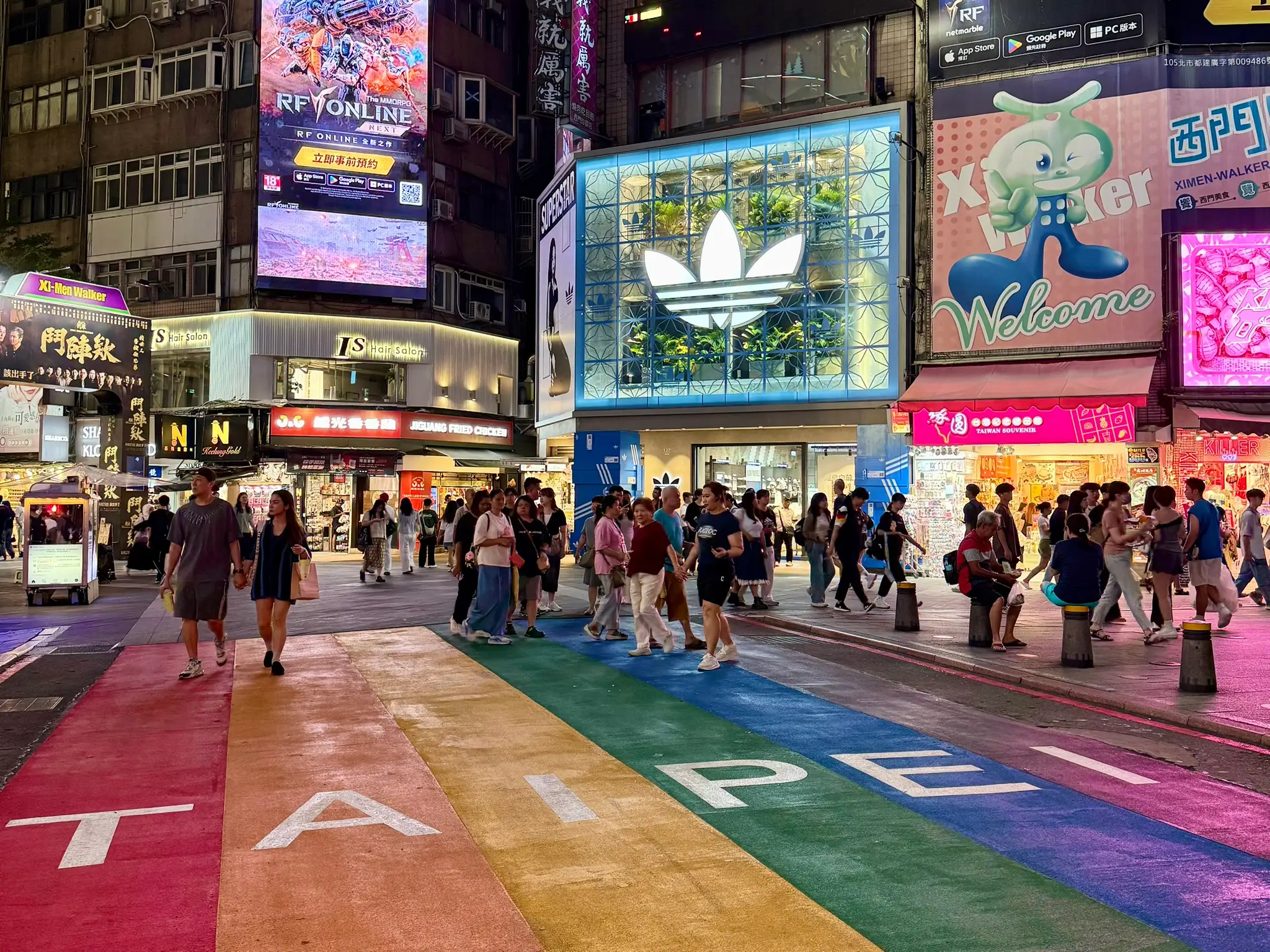 A busy street in Taipei, Taiwan, at night.