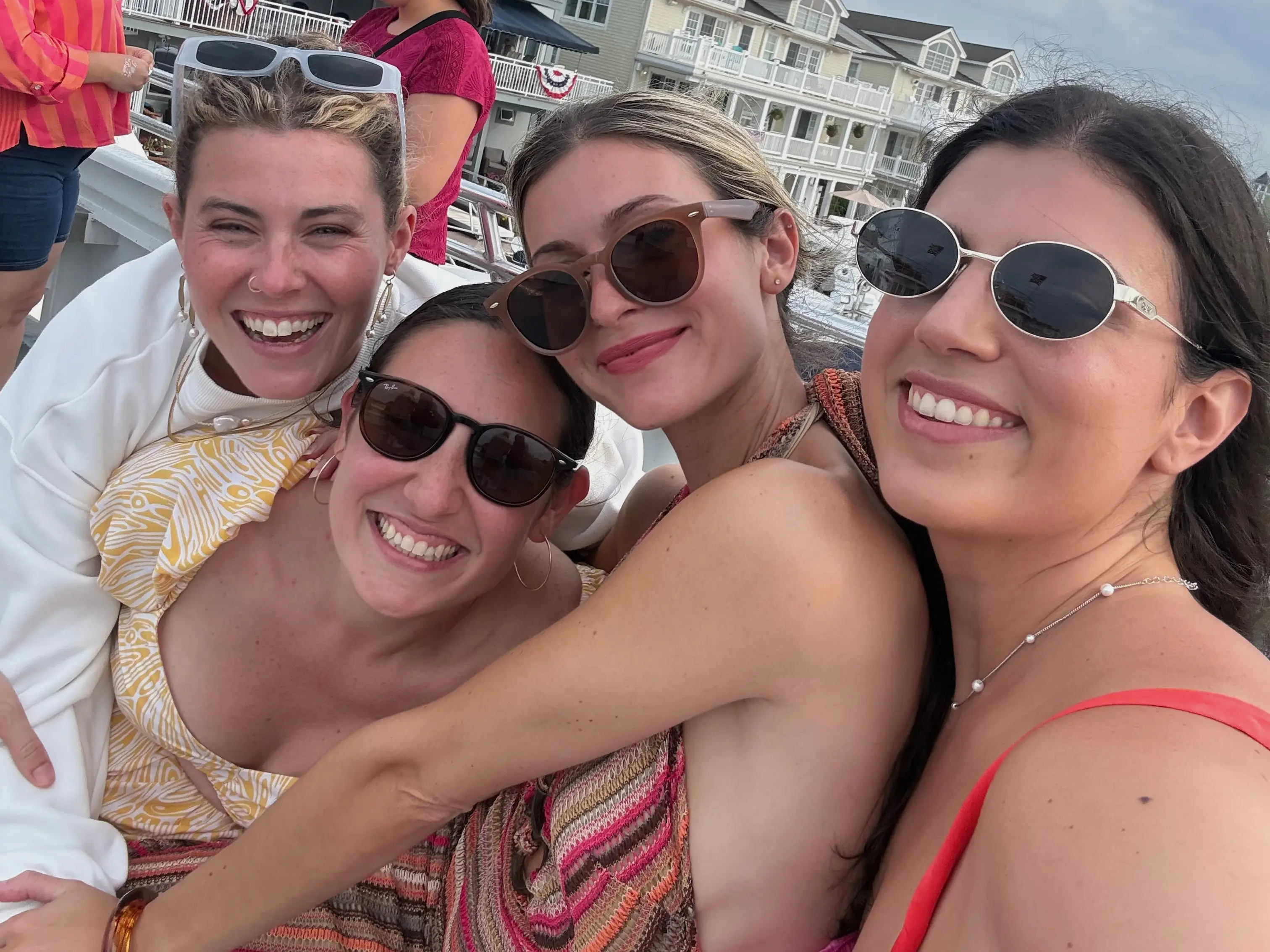 Four girls smiling together for photo