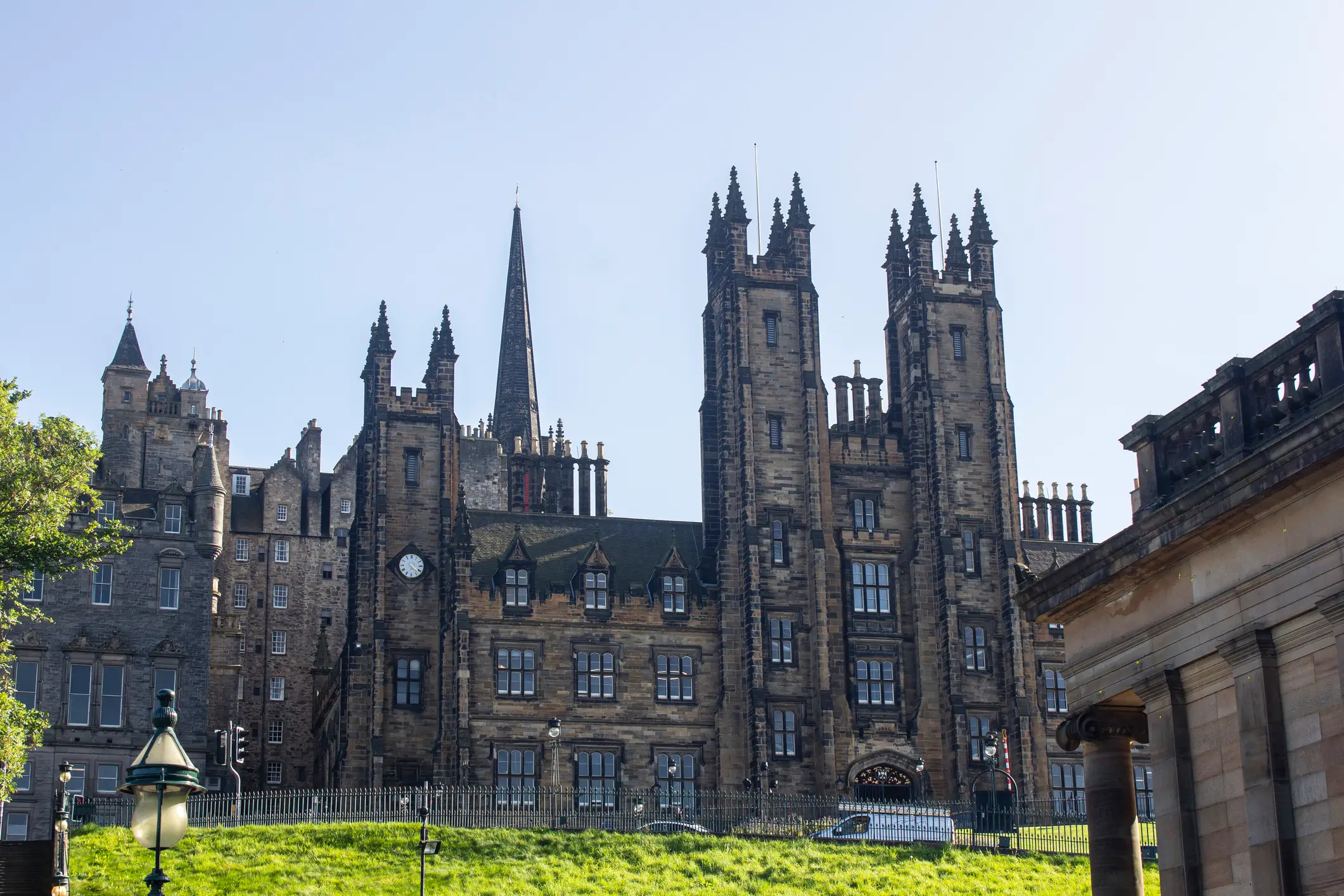 The University of Edinburgh's New College building on a bright, sunny day.