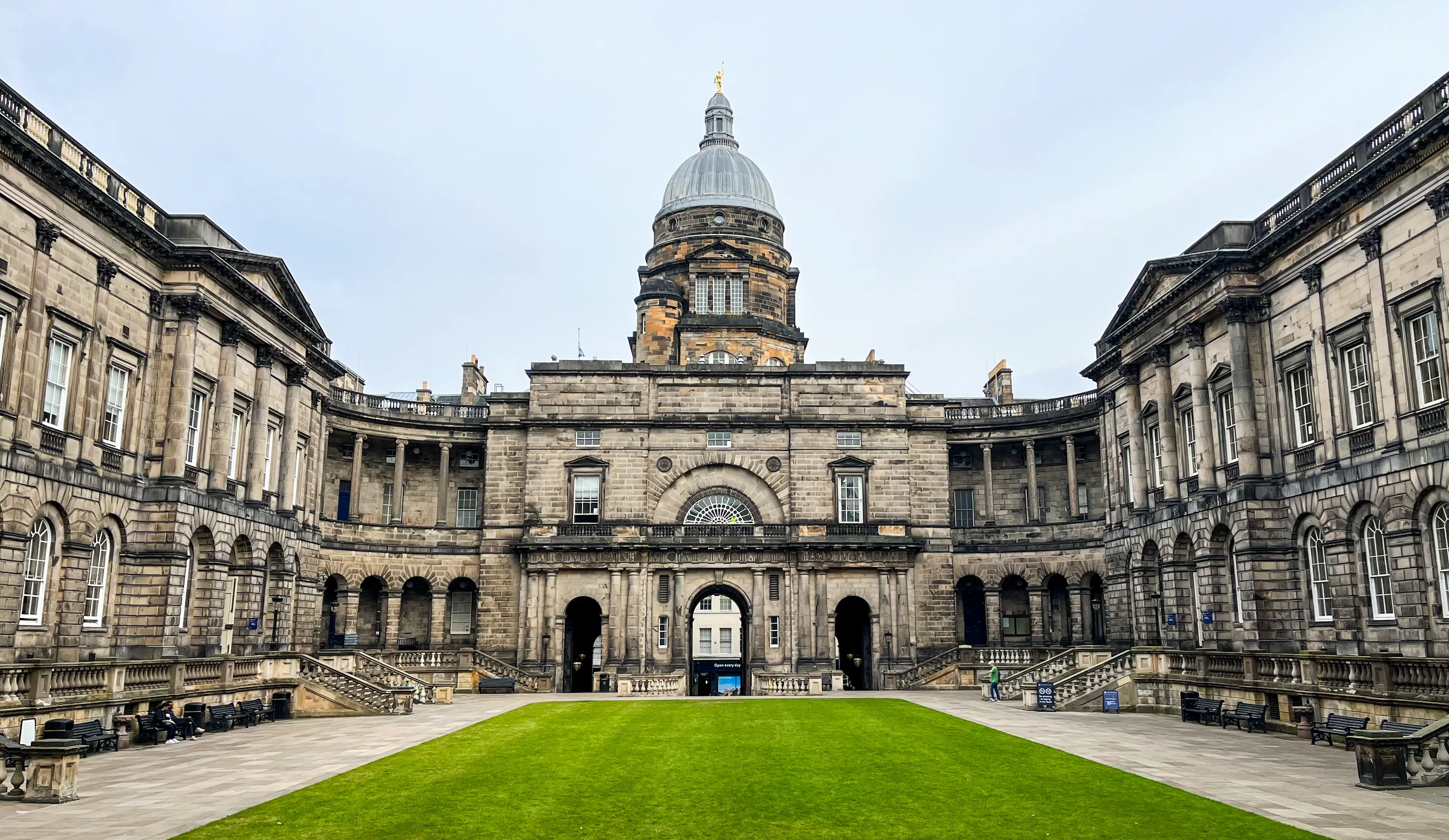 The Old College quadrangle at the University of Edinburgh on a cloudy day.