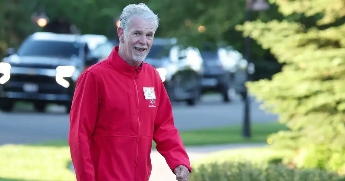 Reed Hastings says AI may push CEOs to cut their workforce in half — or expand their reach