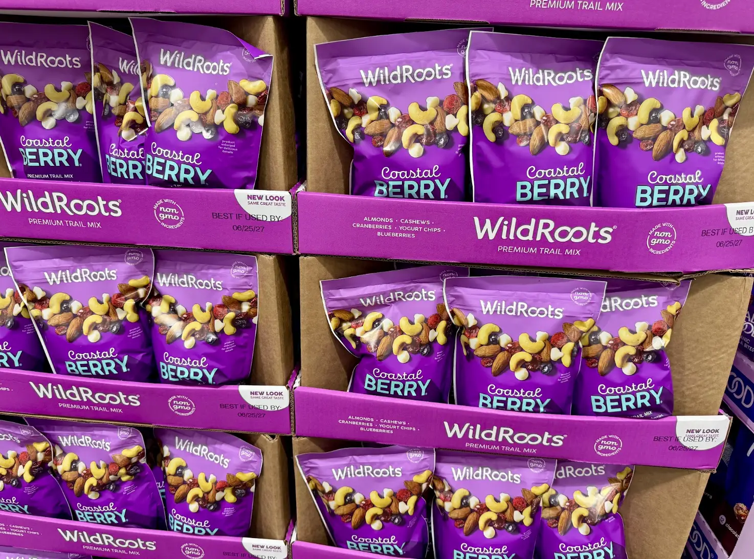 Bags of WildRoots premium trail box on display at Costco.