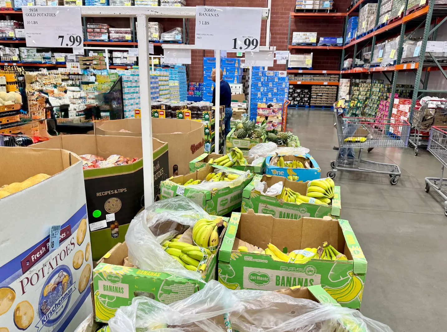 Boxes of bananas on display at Costco.