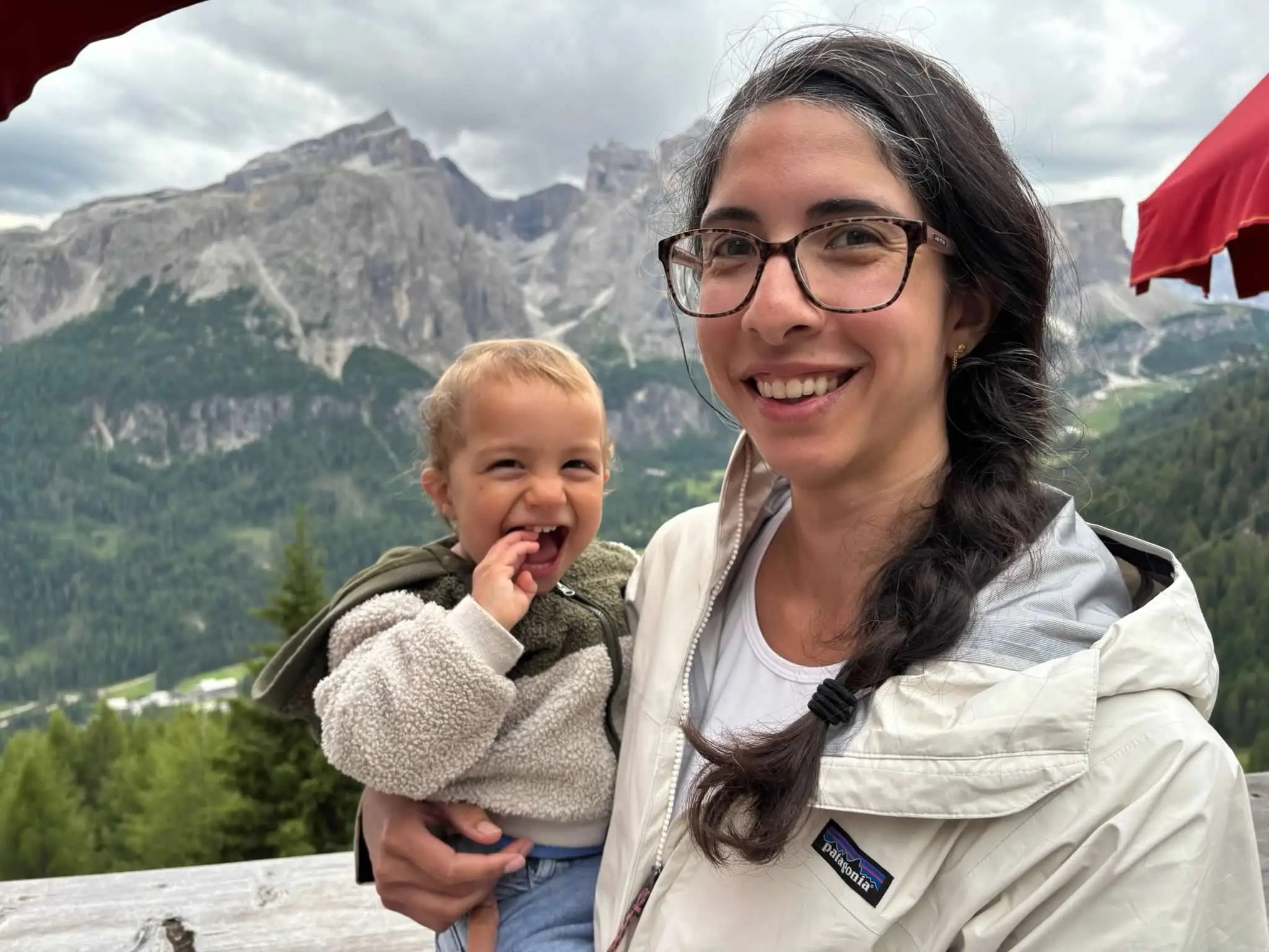 The author and her son enjoy a view from a refugio in the Dolomites.
