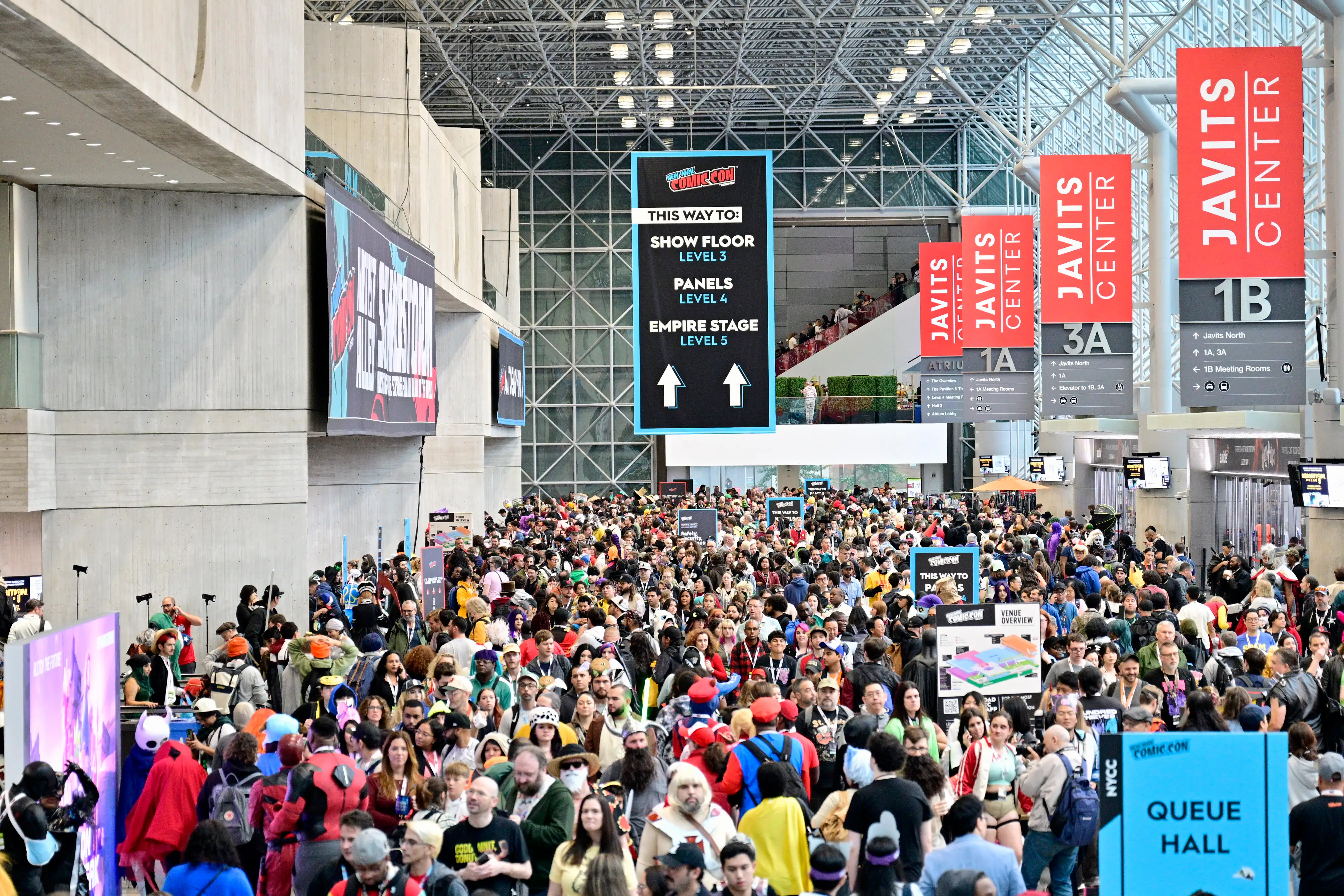 crowd of people in a large hallway at Comic-Con