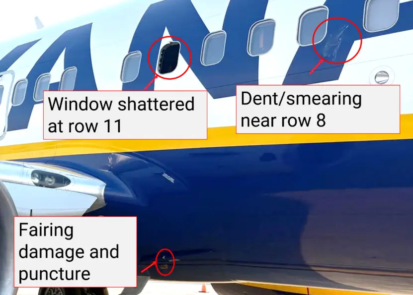 An outside image of a Ryanair plane damaged during a flight.
