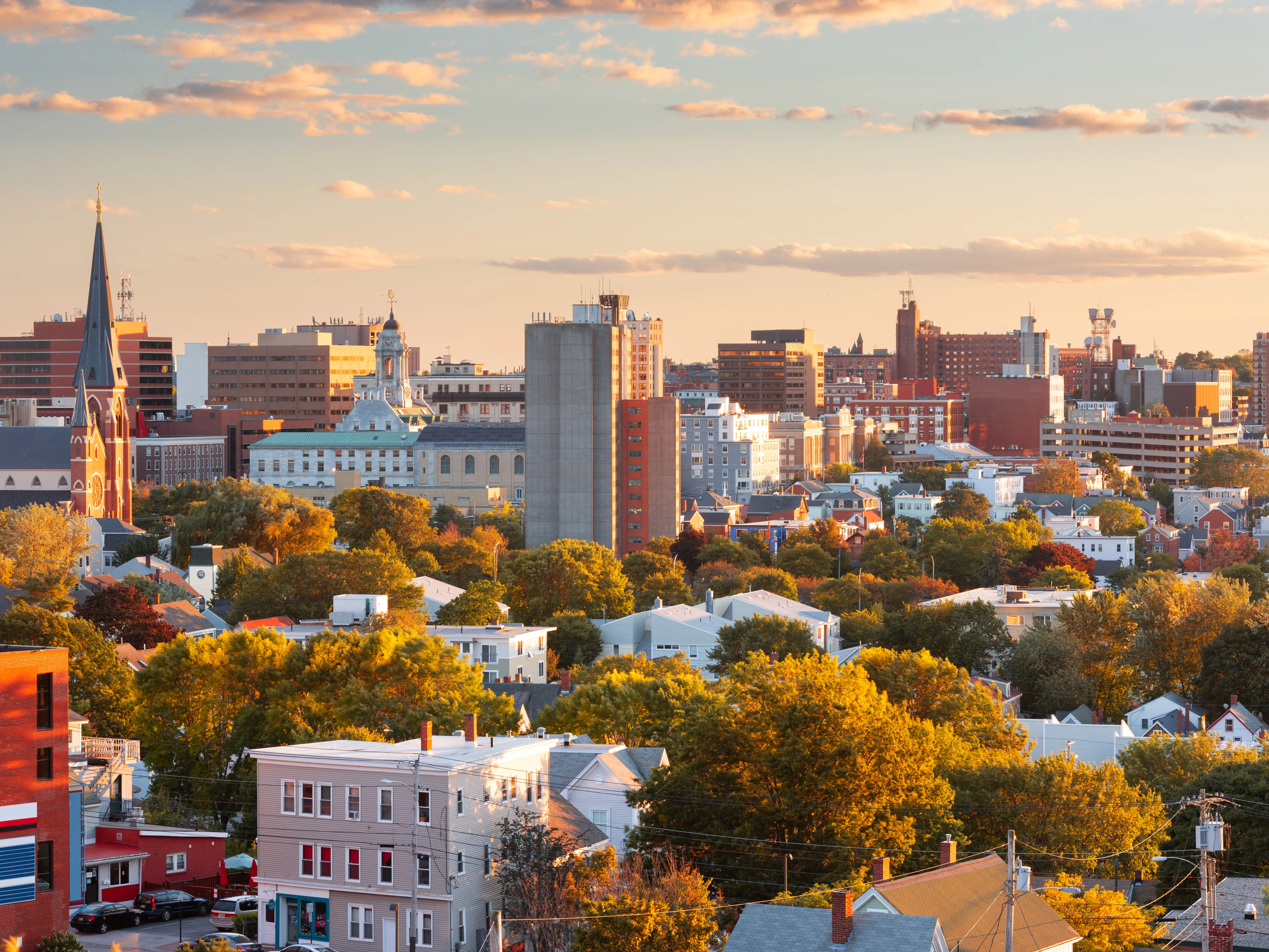 Portland, Maine, USA downtown city skyline at dusk.