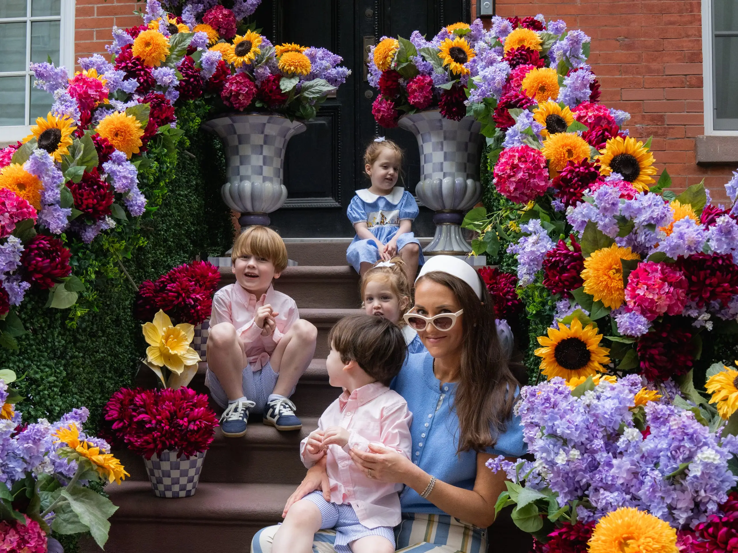 Family sitting on NYC stoop