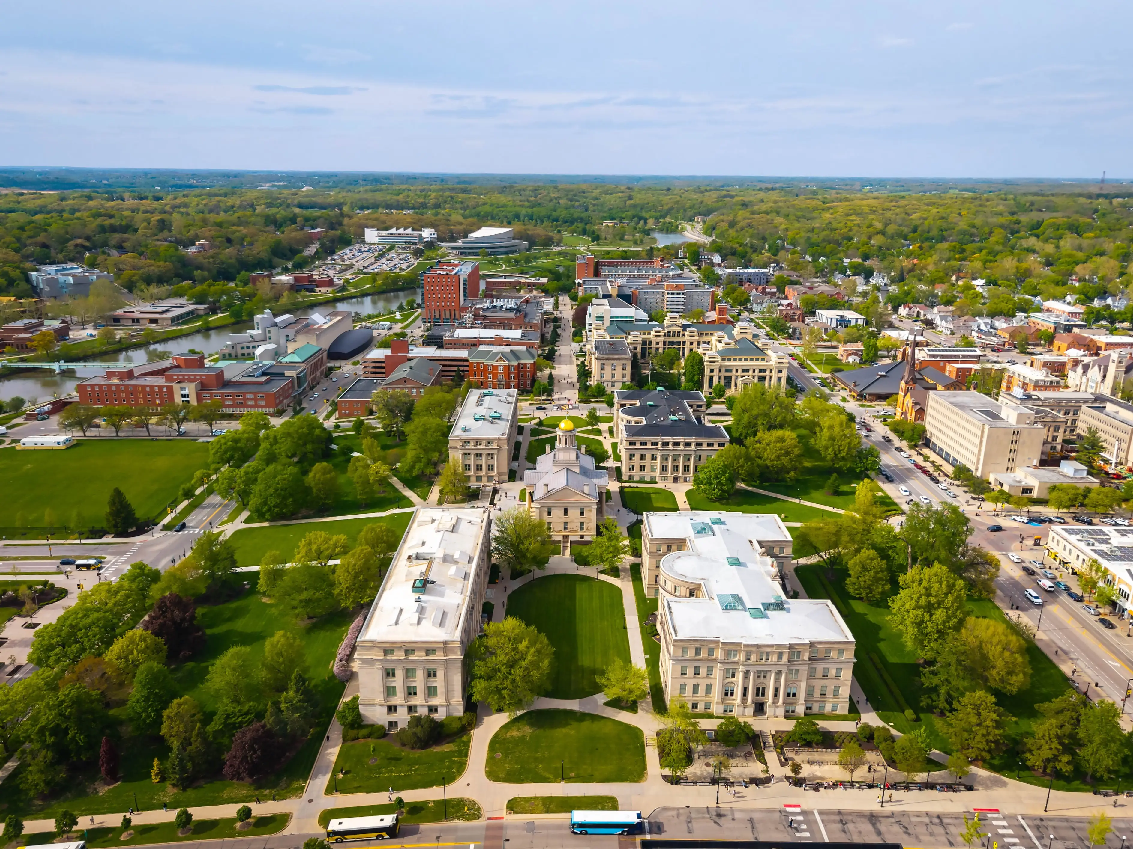 Aerial panoramic view of Old Capitol and surrounding University of Iowa campus buildings.