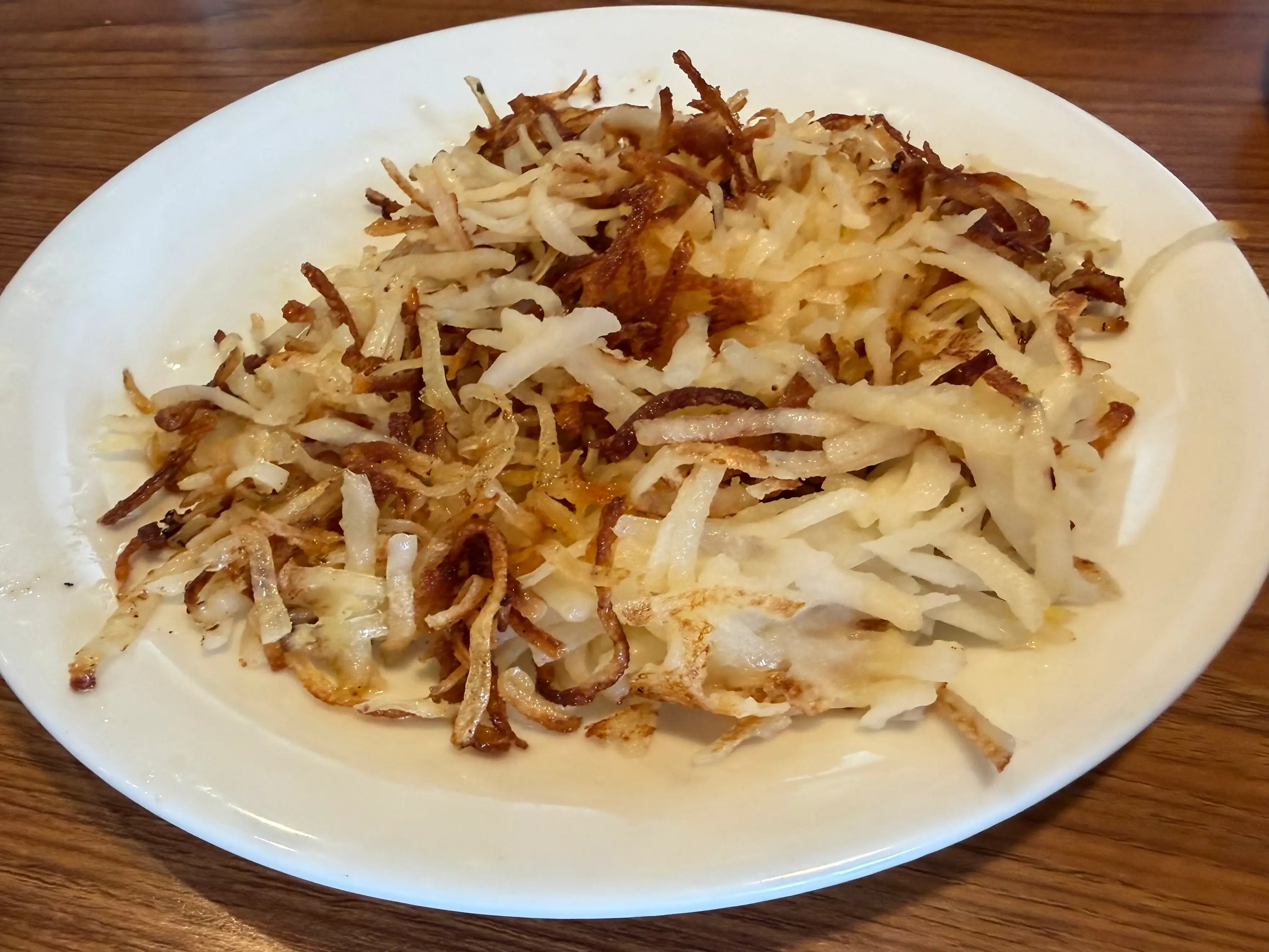 Hashbrowns on plate at Denny's
