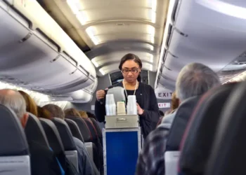 American Airlines is reversing its bet against seatback screens