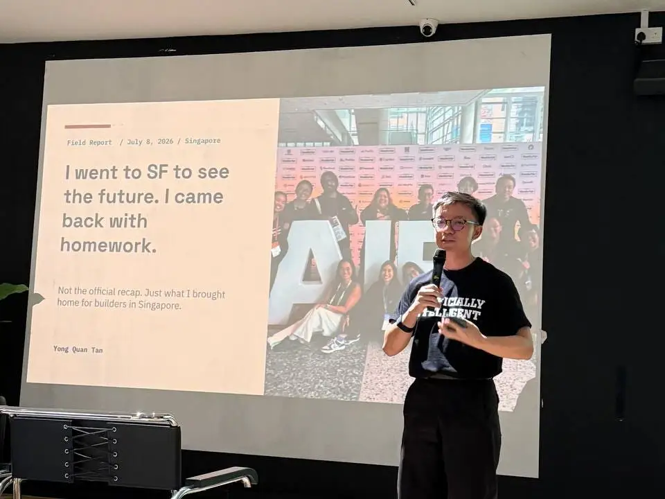 Tan presenting at a builder meetup in Singapore.