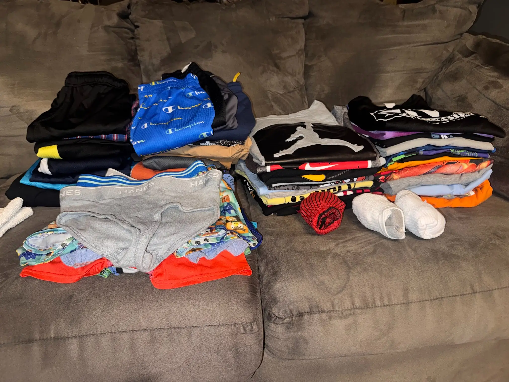 Folded laundry on couch
