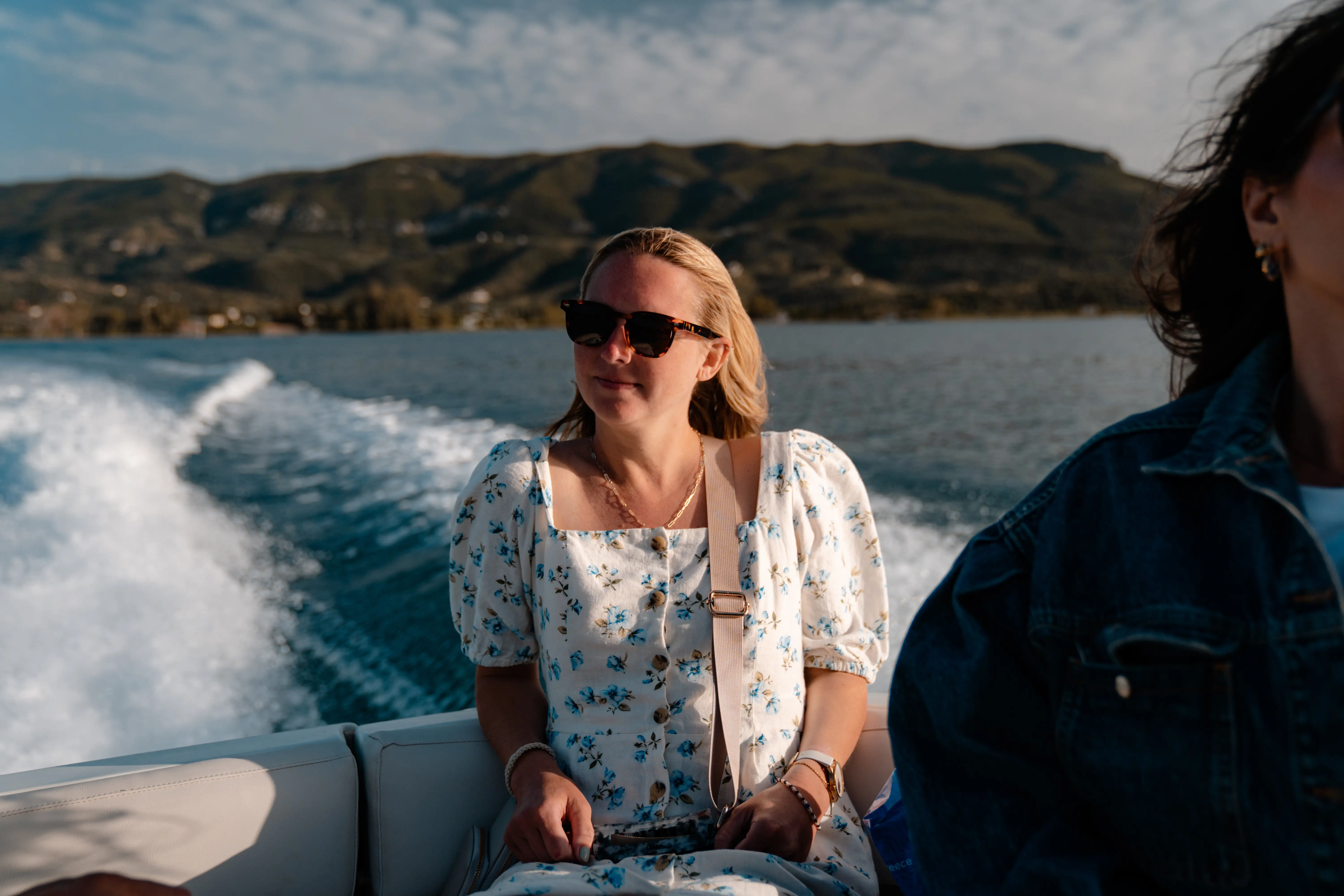 Woman in sunglasses on yacht tender