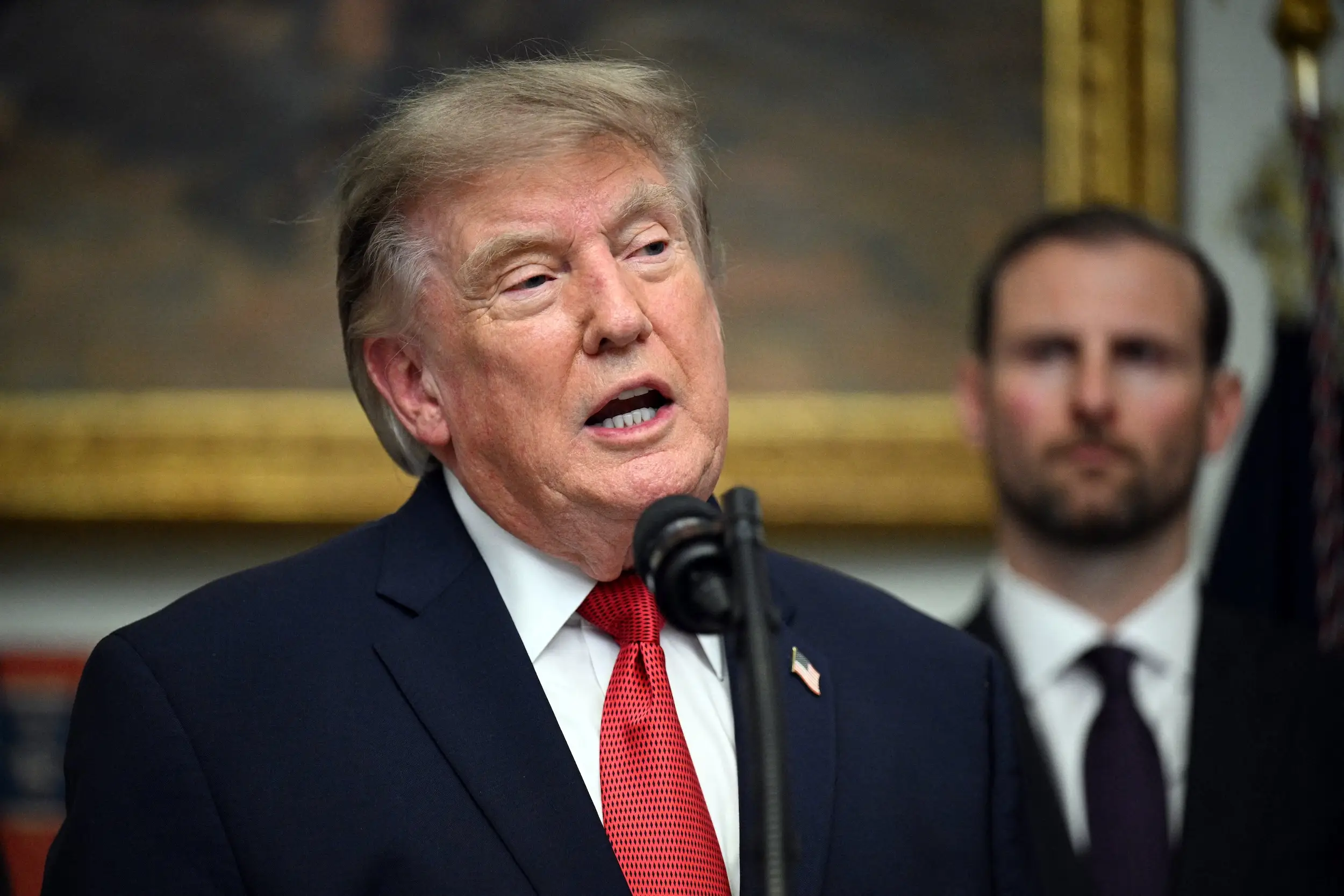Donald Trump speaks during an event at the White House