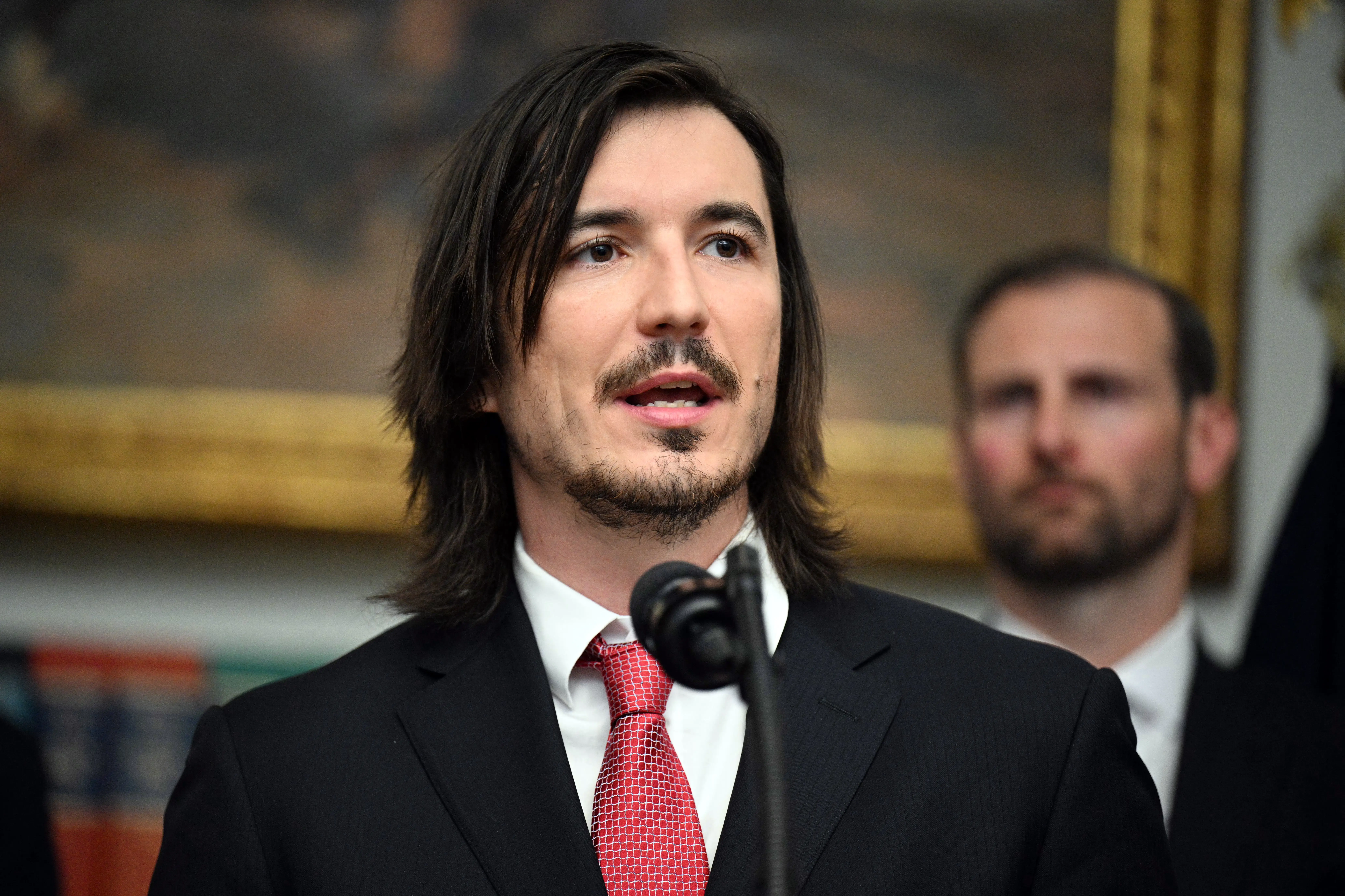 Vladimir Tenev, CEO of the financial technology services company Robinhood, speaks during a meeting with US President Donald Trump and cryptocurrency executives in the Roosevelt Room of the White House in Washington, DC, on August 19, 2026.