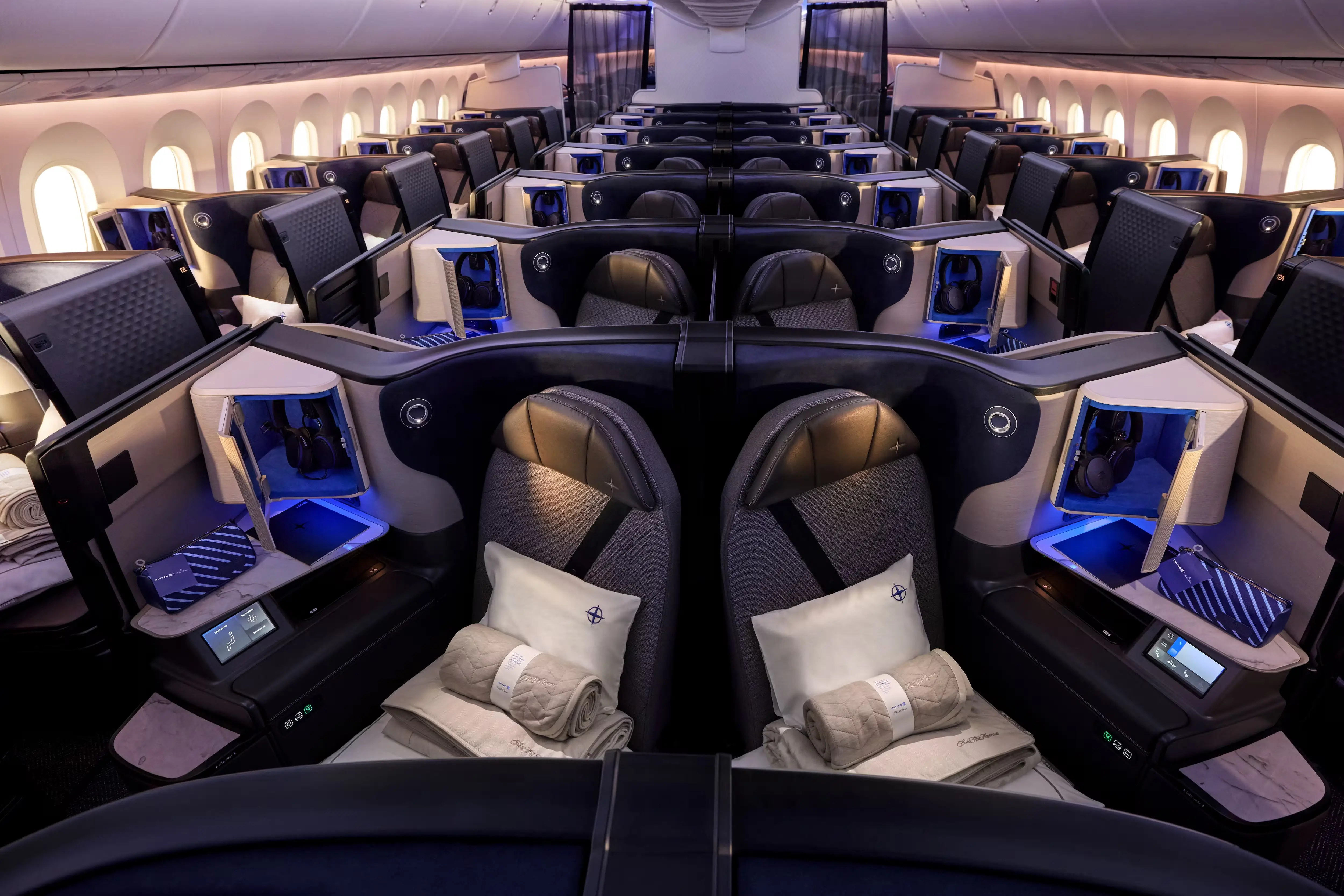 United Airlines' business class cabin shows the Polaris suites in a United Airlines Boeing 787.